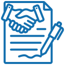 Modern building with wooden exterior walls and large glass window, set against a mountainous landscape with grassy foreground.