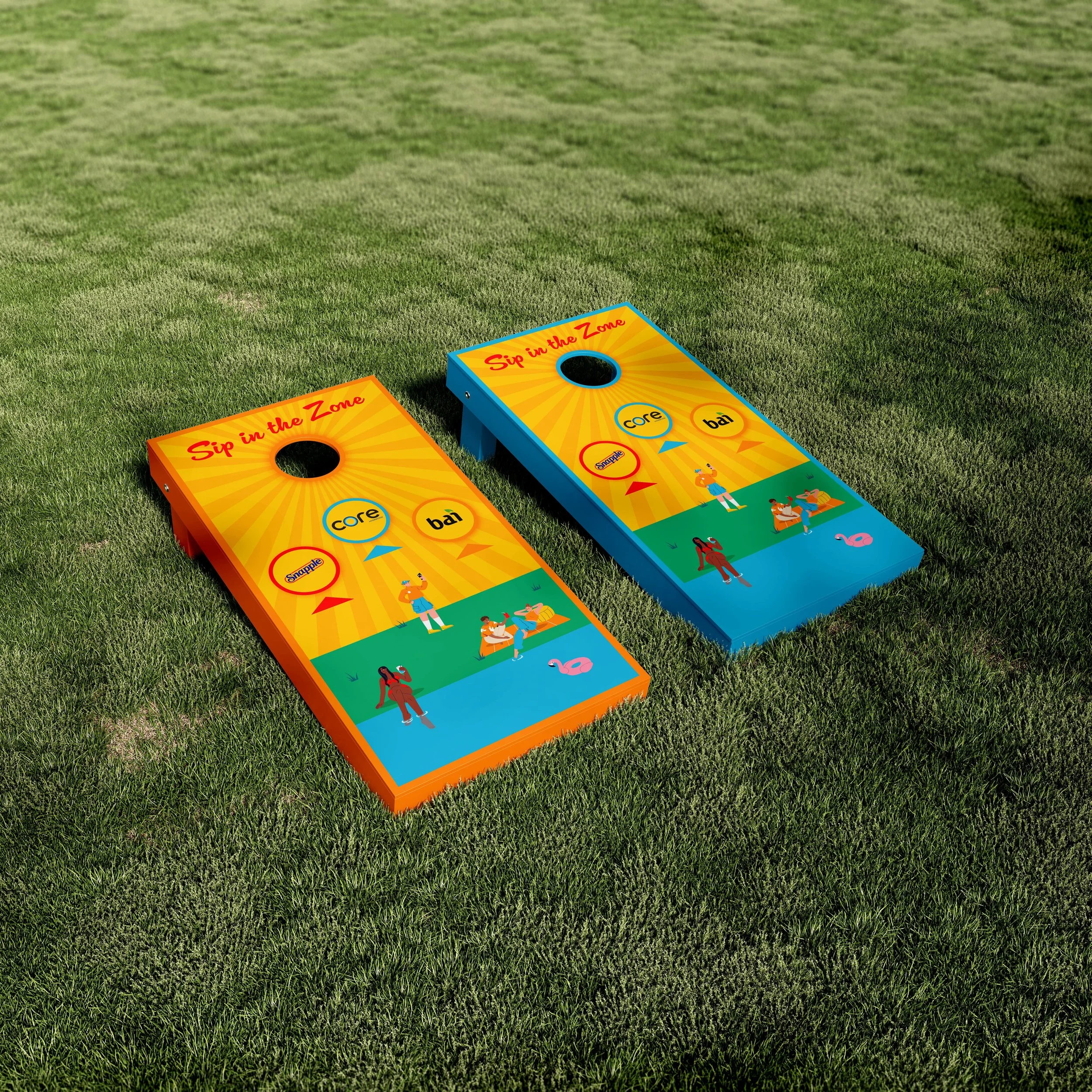 Colorful cornhole boards on a grassy lawn, with the words 'Sip in the Zone' printed on them.