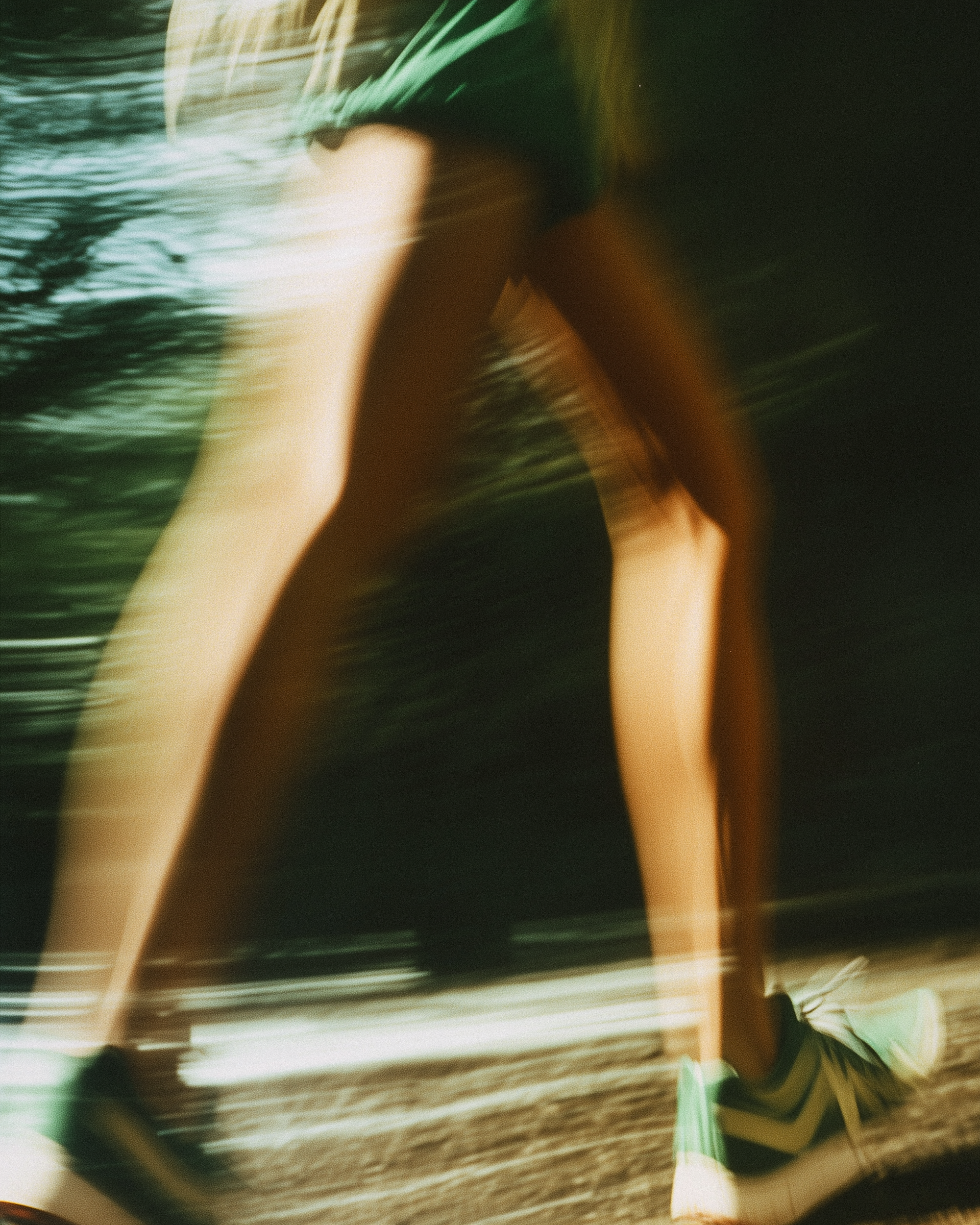 b_vi_film_photography_blurred_photograph_of_female_legs_running_0d71186f-46ec-47eb-95c1-c73d42c1963a.png
