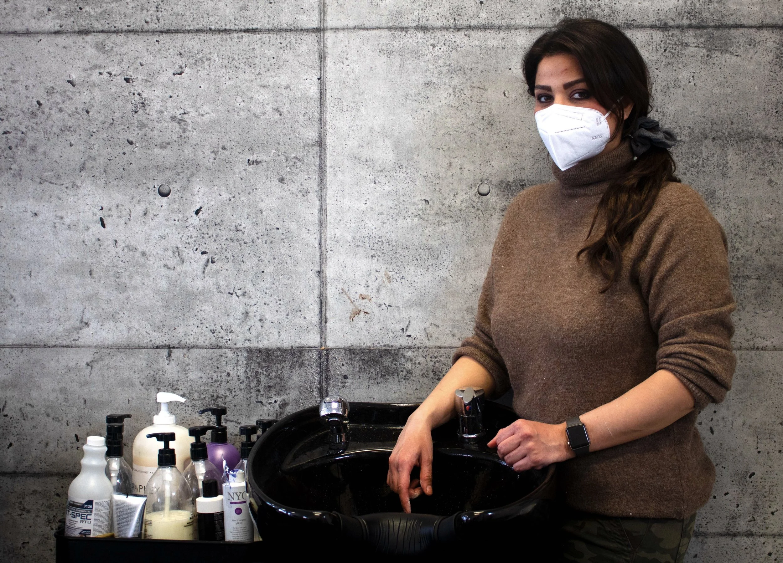 Shadi Estahbanati, 36, is fully booked for the next four weeks as she returns to work at her salon, Hair by Shadi, in Brossard, south shore of Montreal, on Tuesday, February 9, 2021. Estahbanati masters the balayage technique.