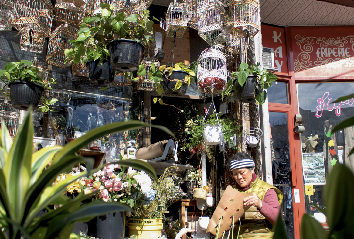 Tamey Lau, the owner of Dragon Flowers, prepares a bouquet at her shop in Montreal’s Mile End. Lau opened the shop three years after arriving in Canada from China and has run it for 38 years. She starts working at 7 a.m. every day and considers her s
