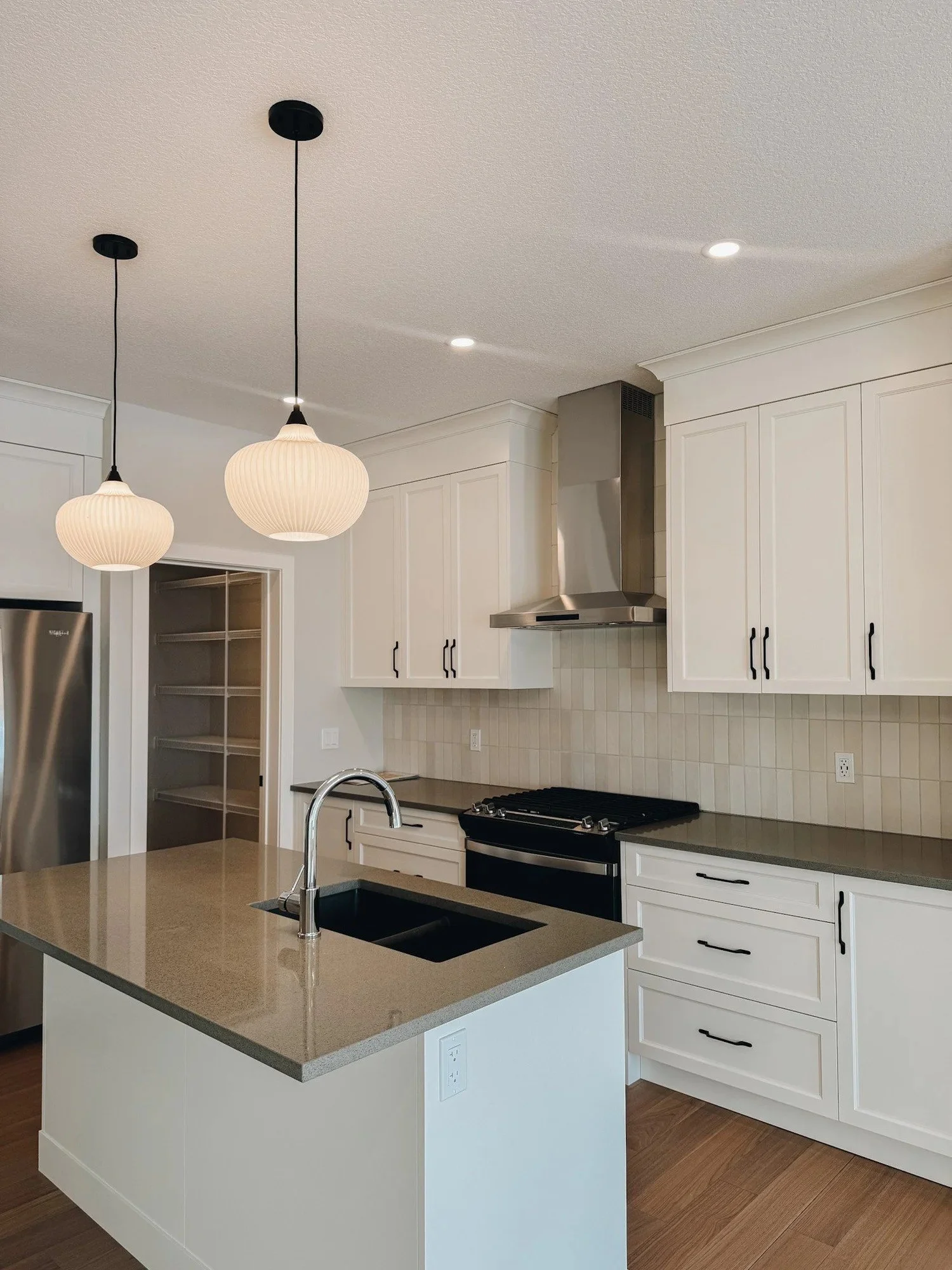 Fireside Cochrane Homes for Sale: A Triple Garage Walkout Tour