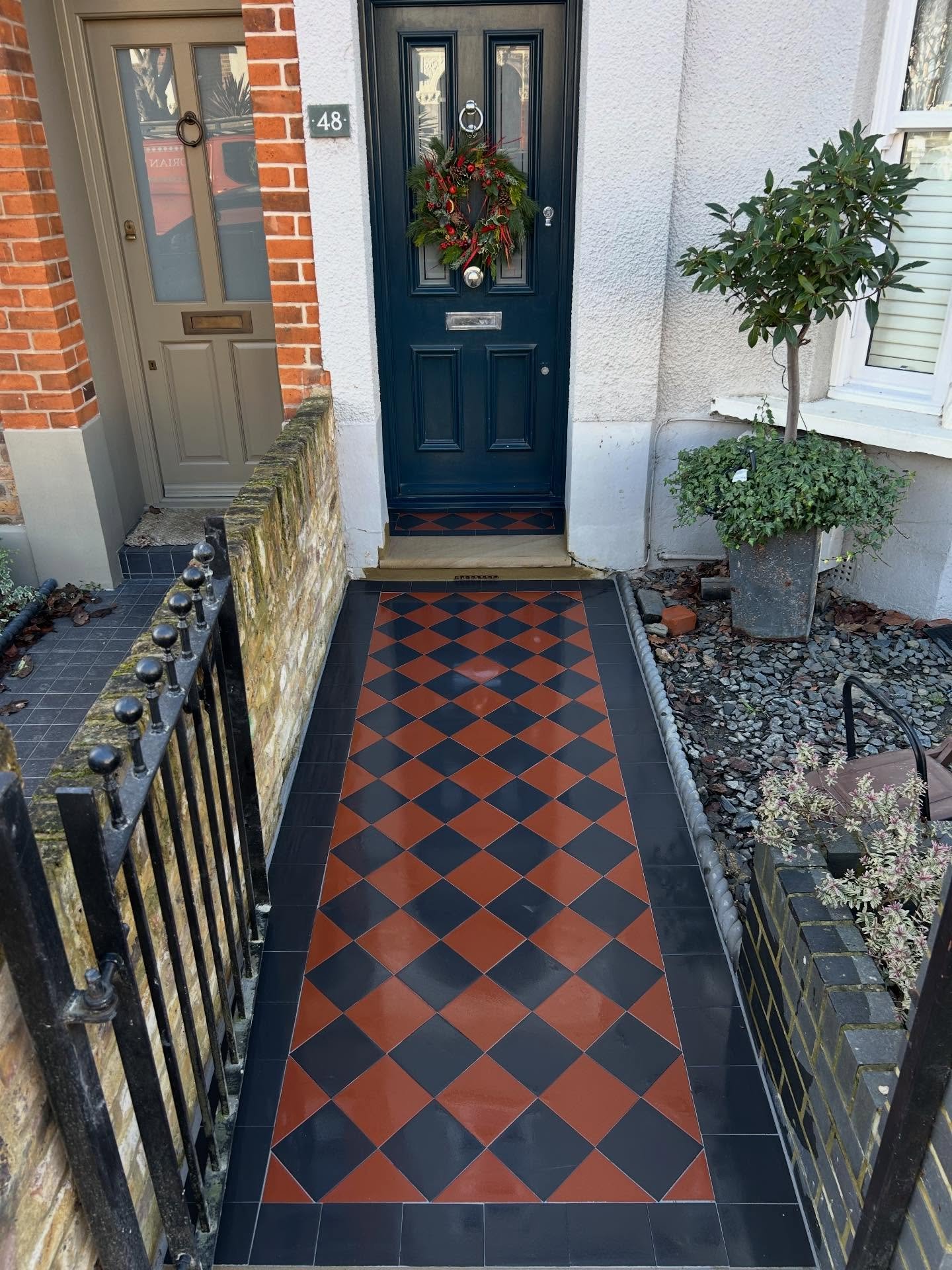 A simple but effective design was created using 150mm black tiles supplied by @originalfeaturesuk