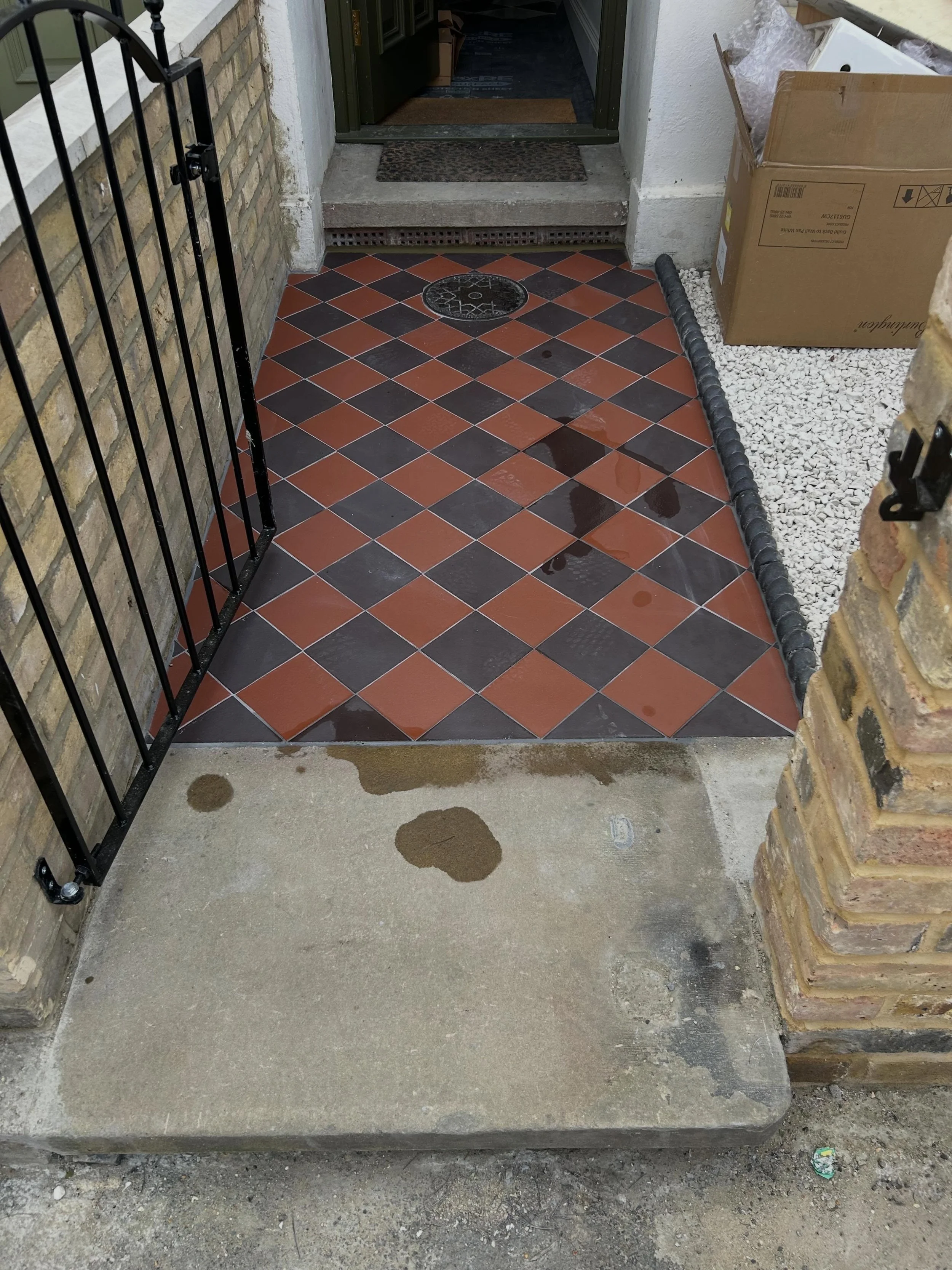 Red and black quarry tiles to match original design #leyton #victorianterrace #victorianpath