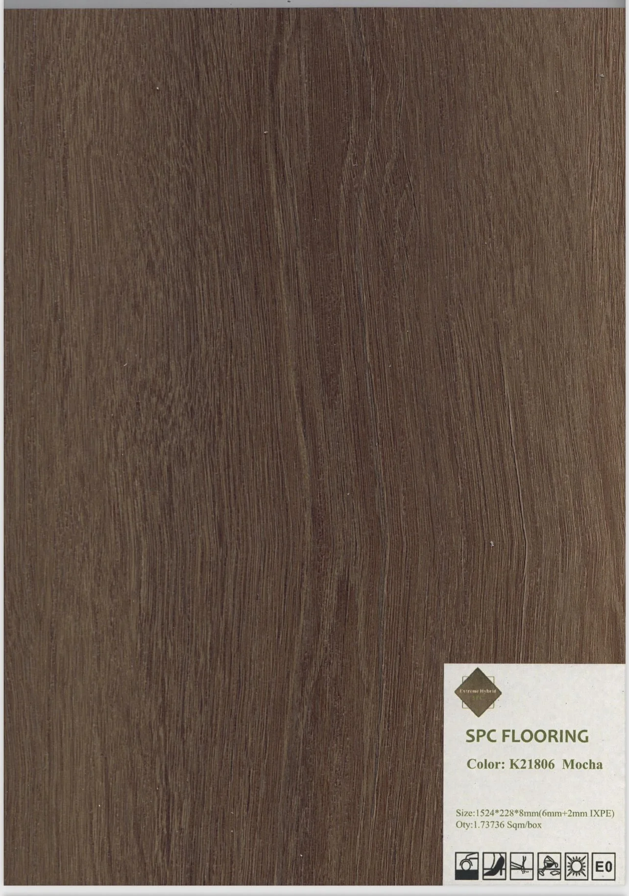 Sample of SPC flooring in mocha color with wood grain pattern.
