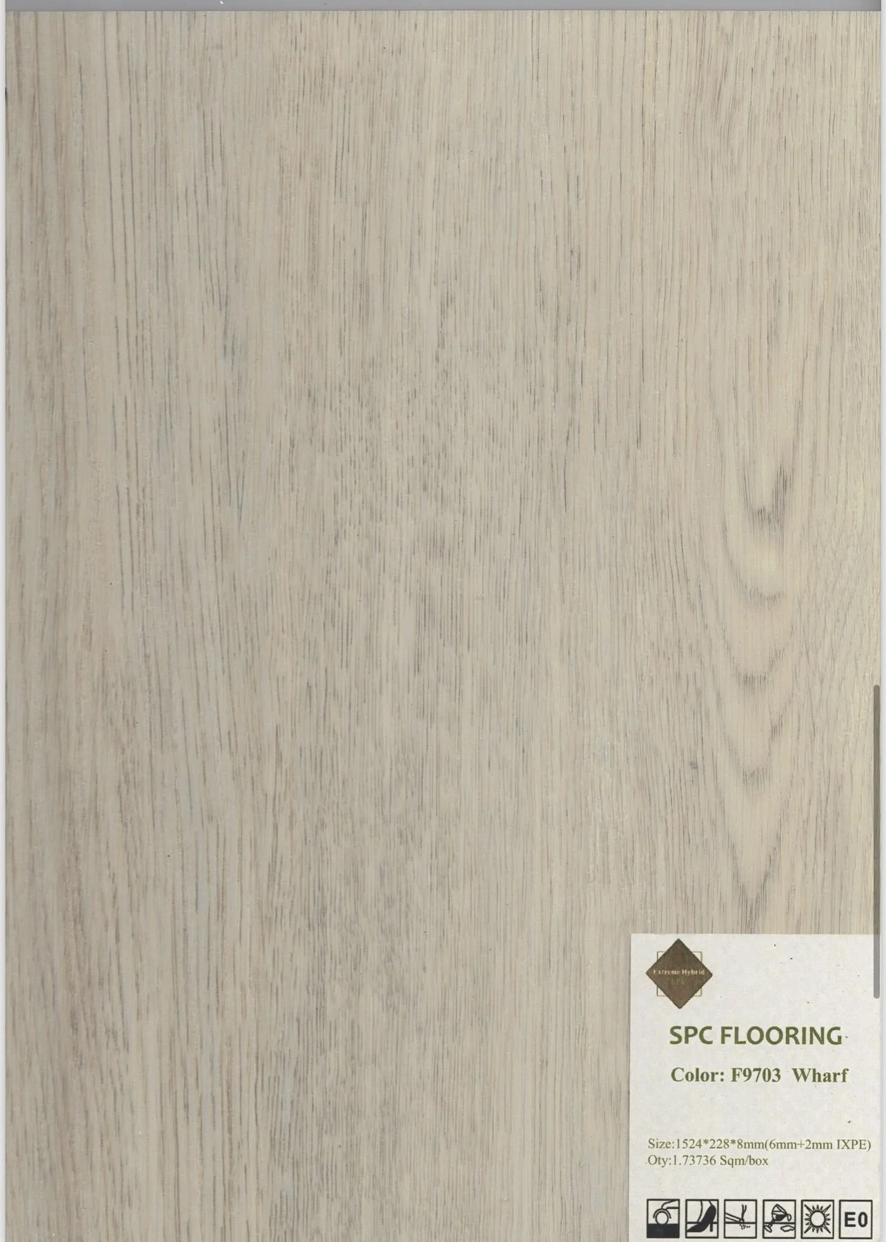 Sample of SPC flooring in a light wood finish, labeled as 'Color: F9703 Wharf'.
