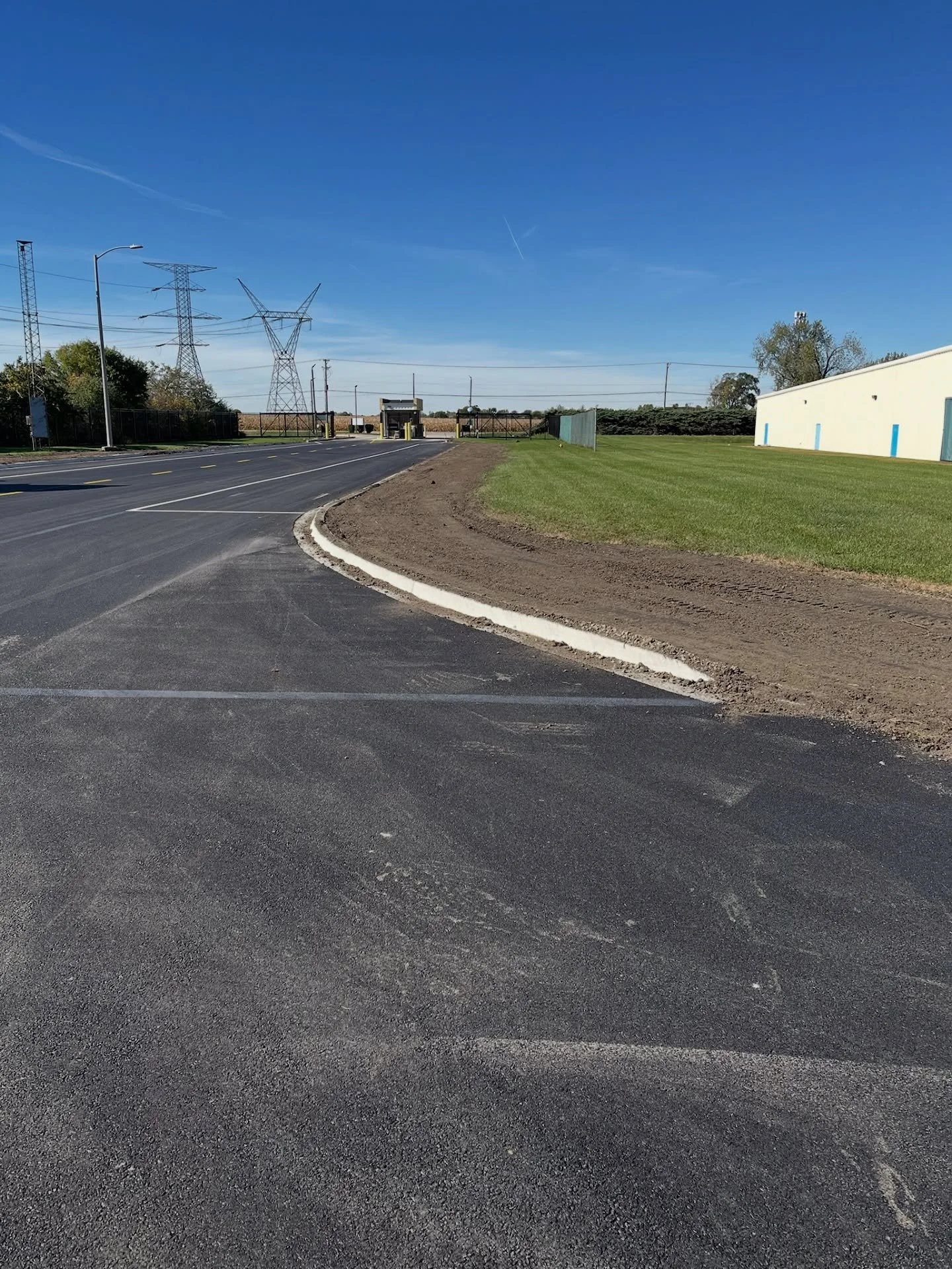 Another project wrapped up ✅

For this customer in Frankfort, we replaced and widened their main drive. Complete with excavation, new curbs, new base, removal of old asphalt, and fresh paving.
Big thanks to Schuepfer Inc for coming in to handle the c