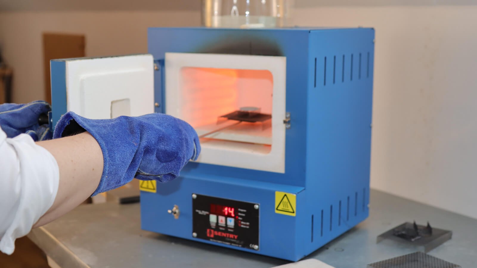 Alison Moriarty firing a watch dial