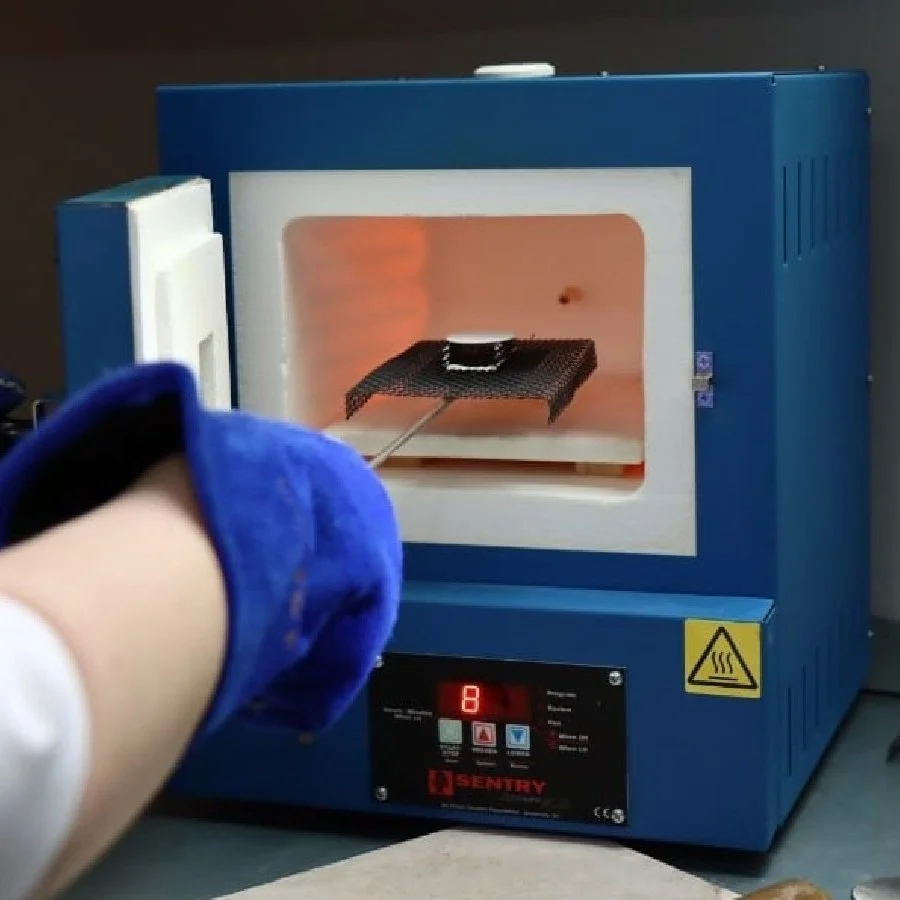 Alison Moriarty firing a watch dial