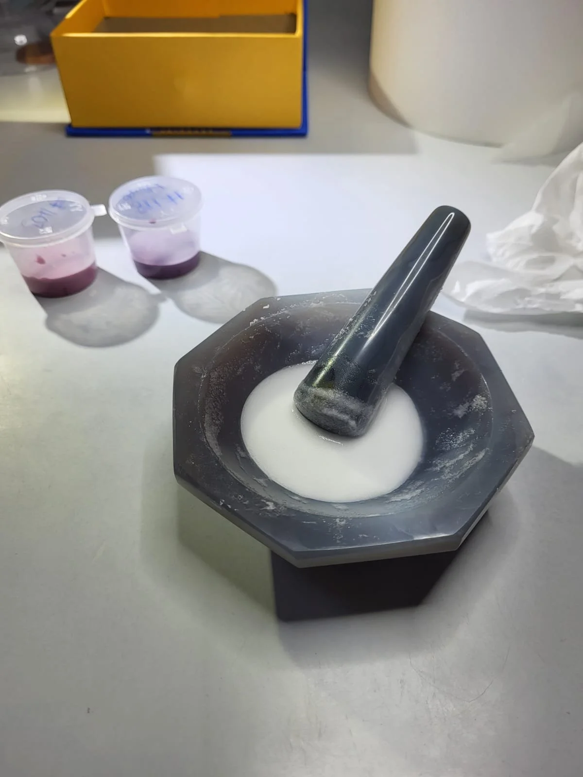 Enamel being prepared for painting onto a watch dial
