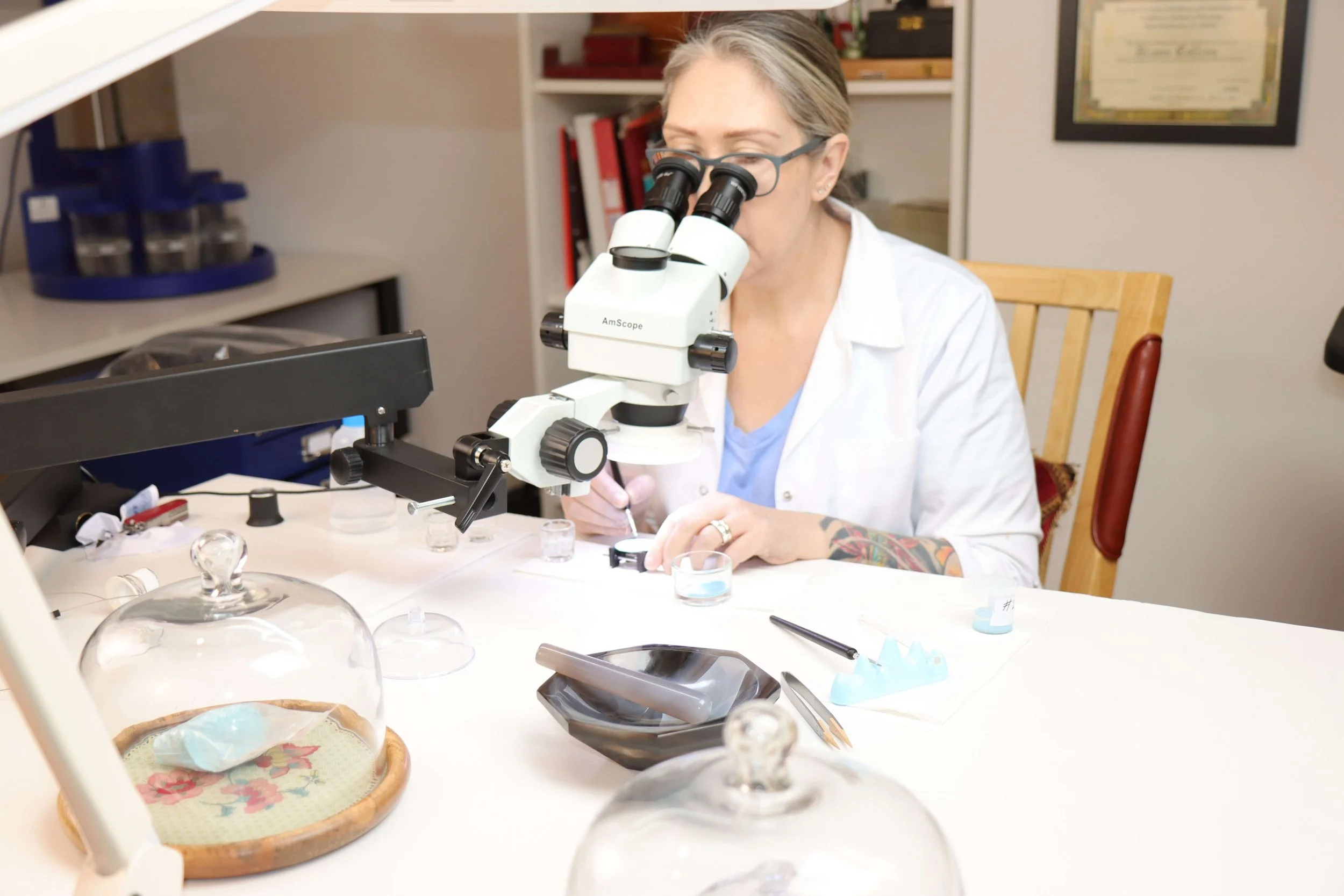 Alison Moriarty enameling a watch dial
