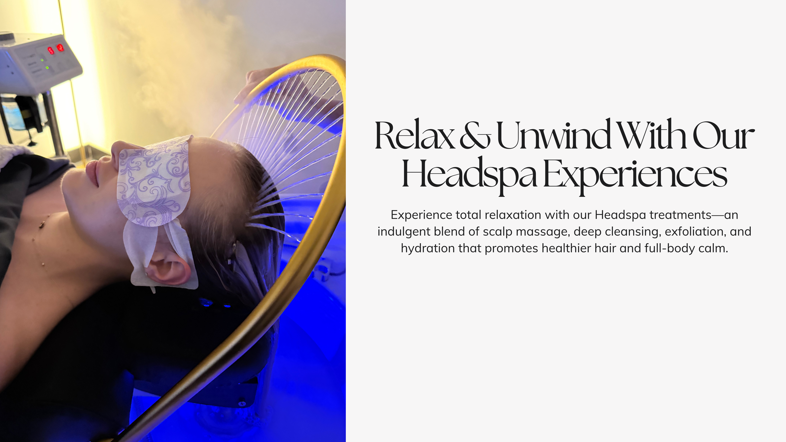 A woman lying on a treatment bed receiving a scalp treatment, wearing a hair mask and an eye mask, with blue LED lights over her head, in a spa-like setting.