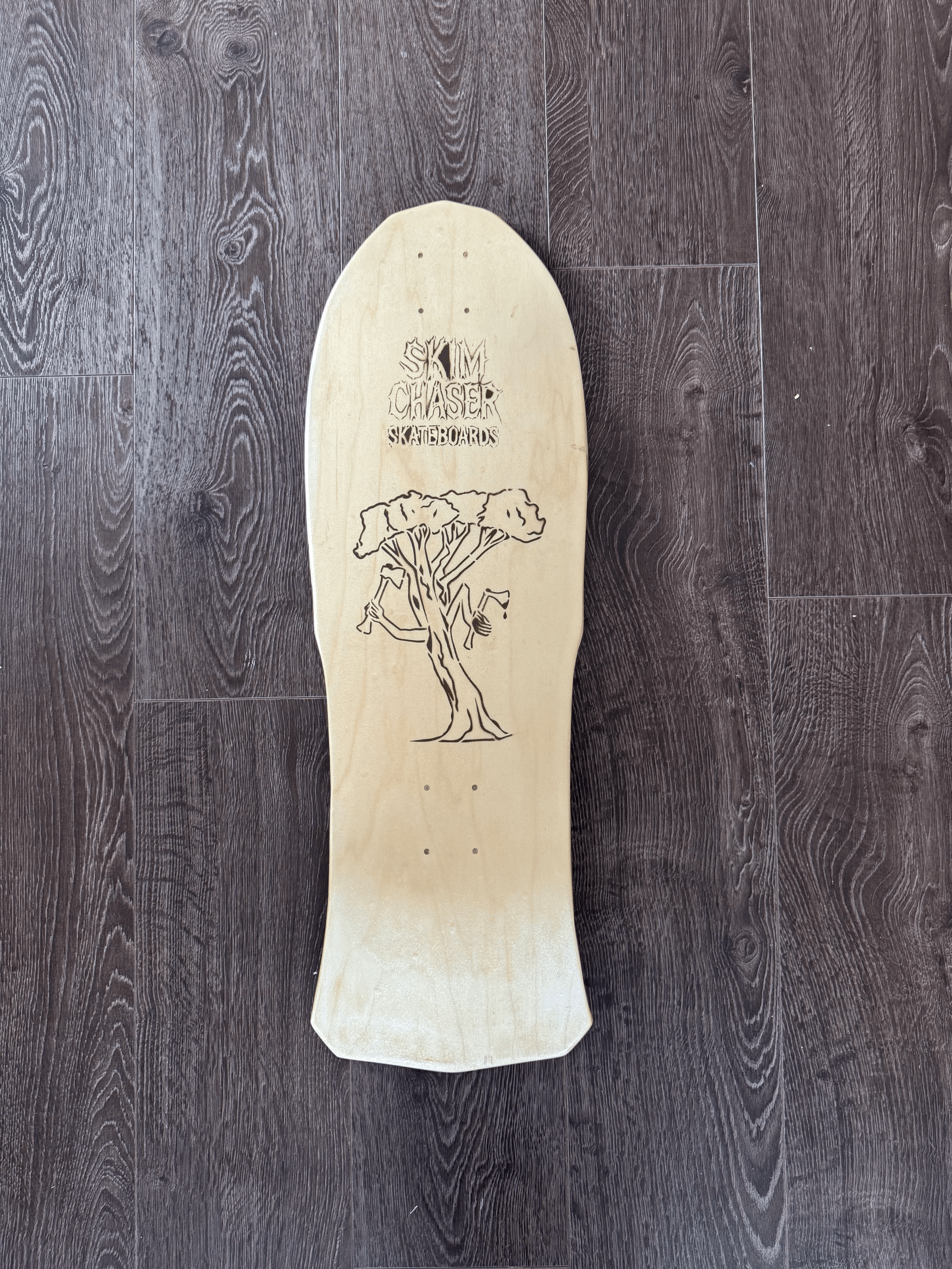 Maple skateboard with a fiberglass bottom