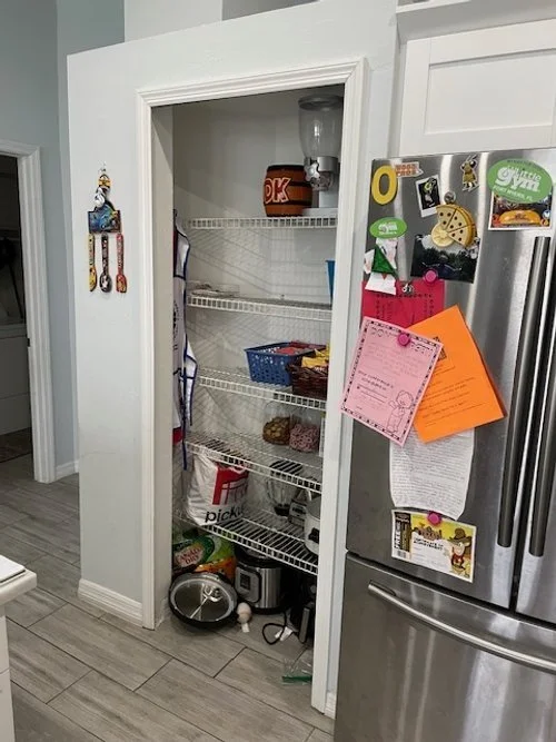This pantry was not functioning for the family with its builder grade cabinets and the shelf spacing.