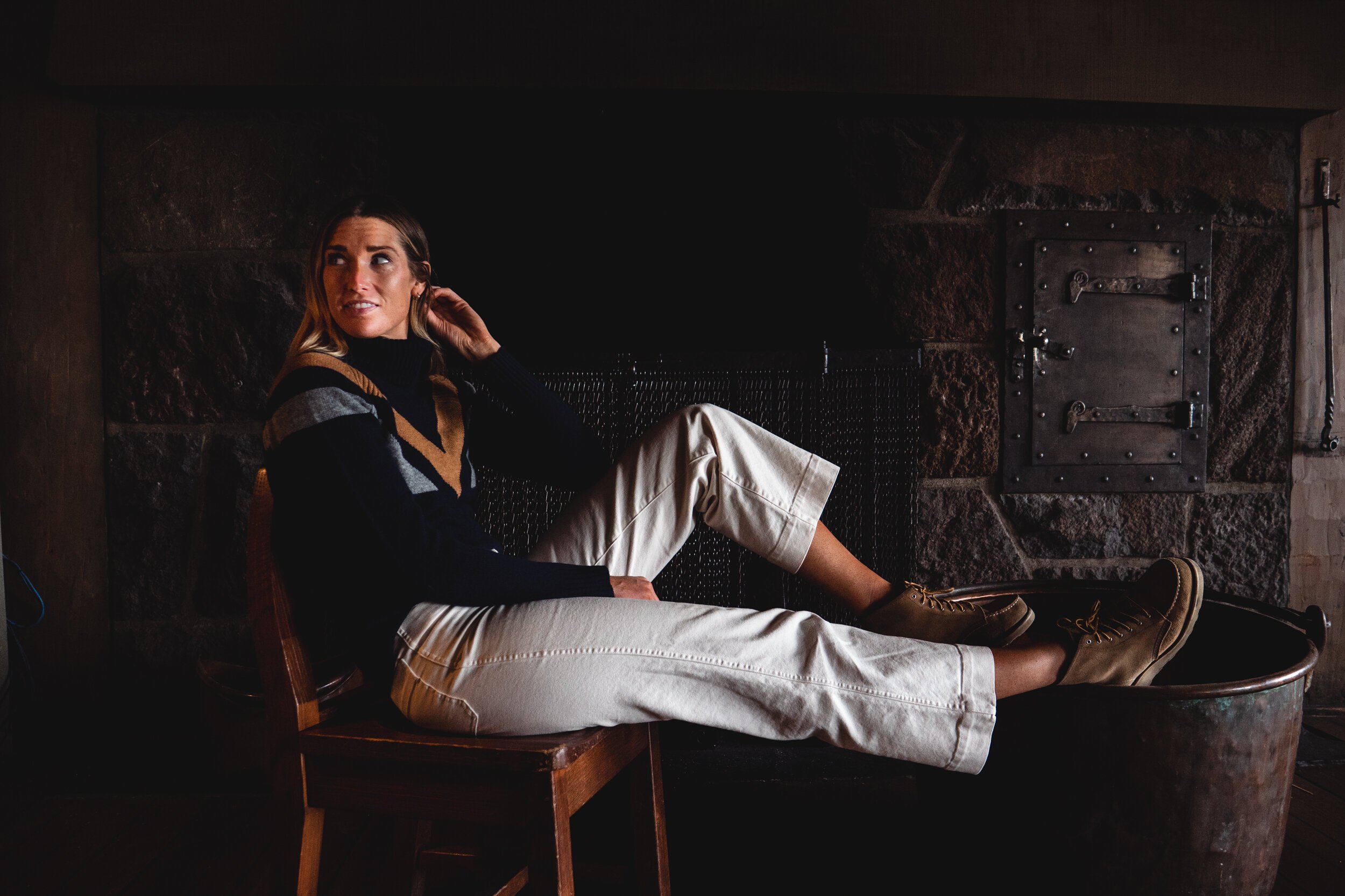 woman against fireplace fashion