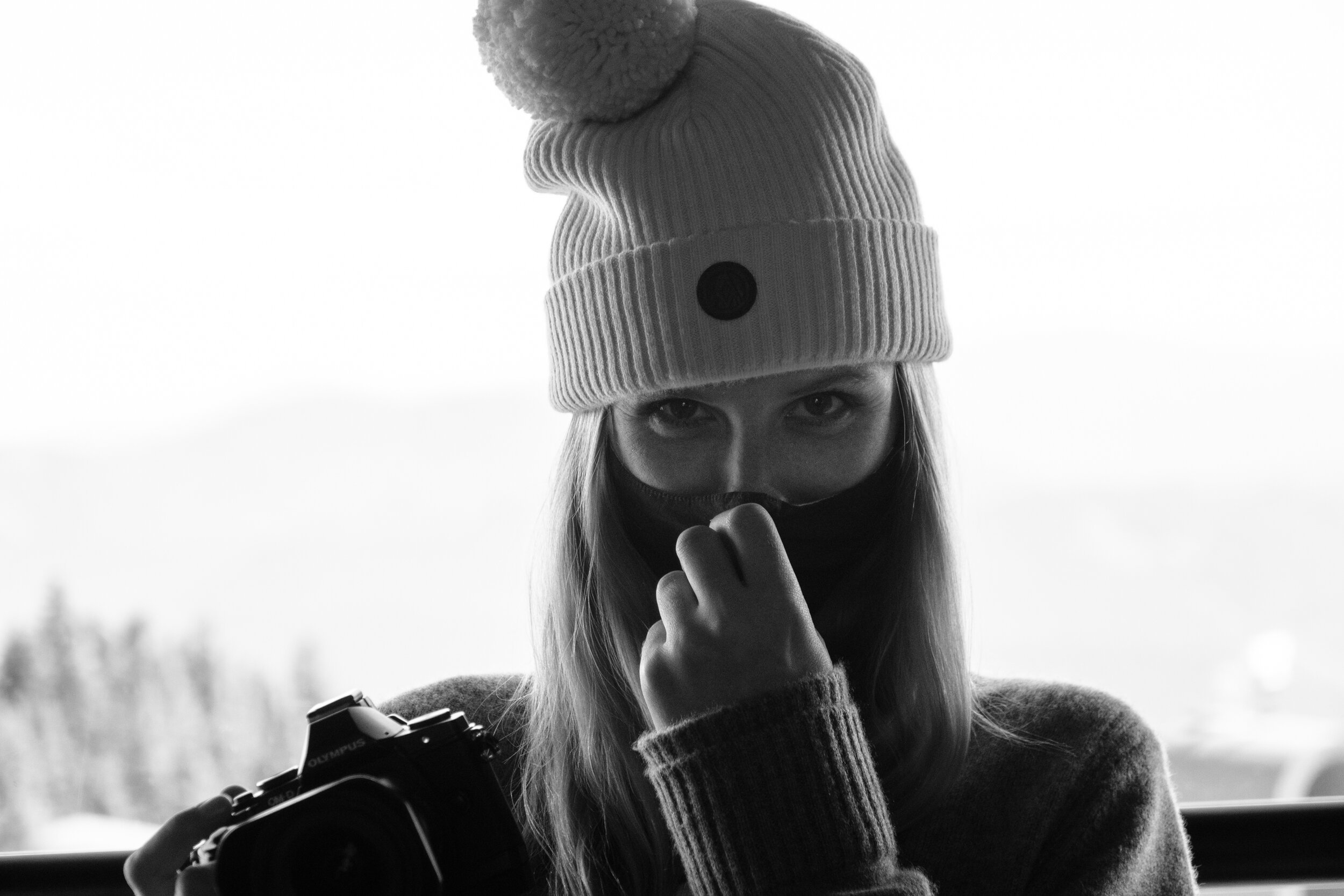 black and white girl behind sweater