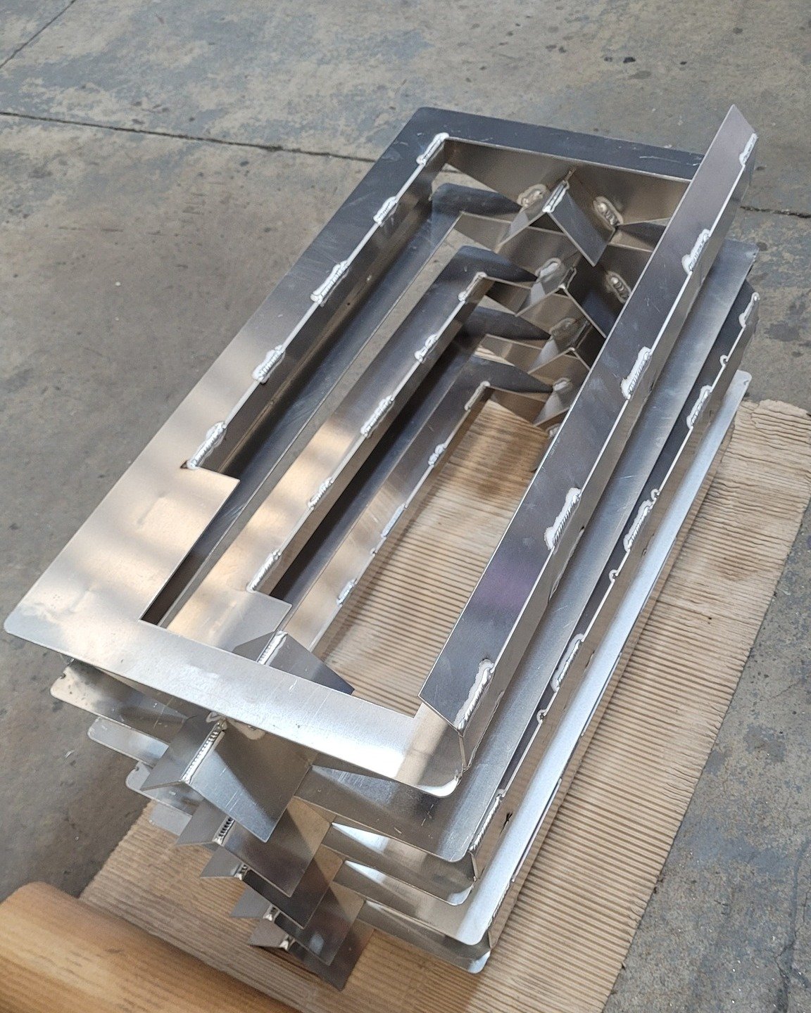 Custom made sign mounts, made from 3mm aluminium.

Our client provided us with laser cut pieces for us to assemble and weld into the final product.

Get in touch for batch jobs or repeat work. We can provide a full manufacturing service from design t