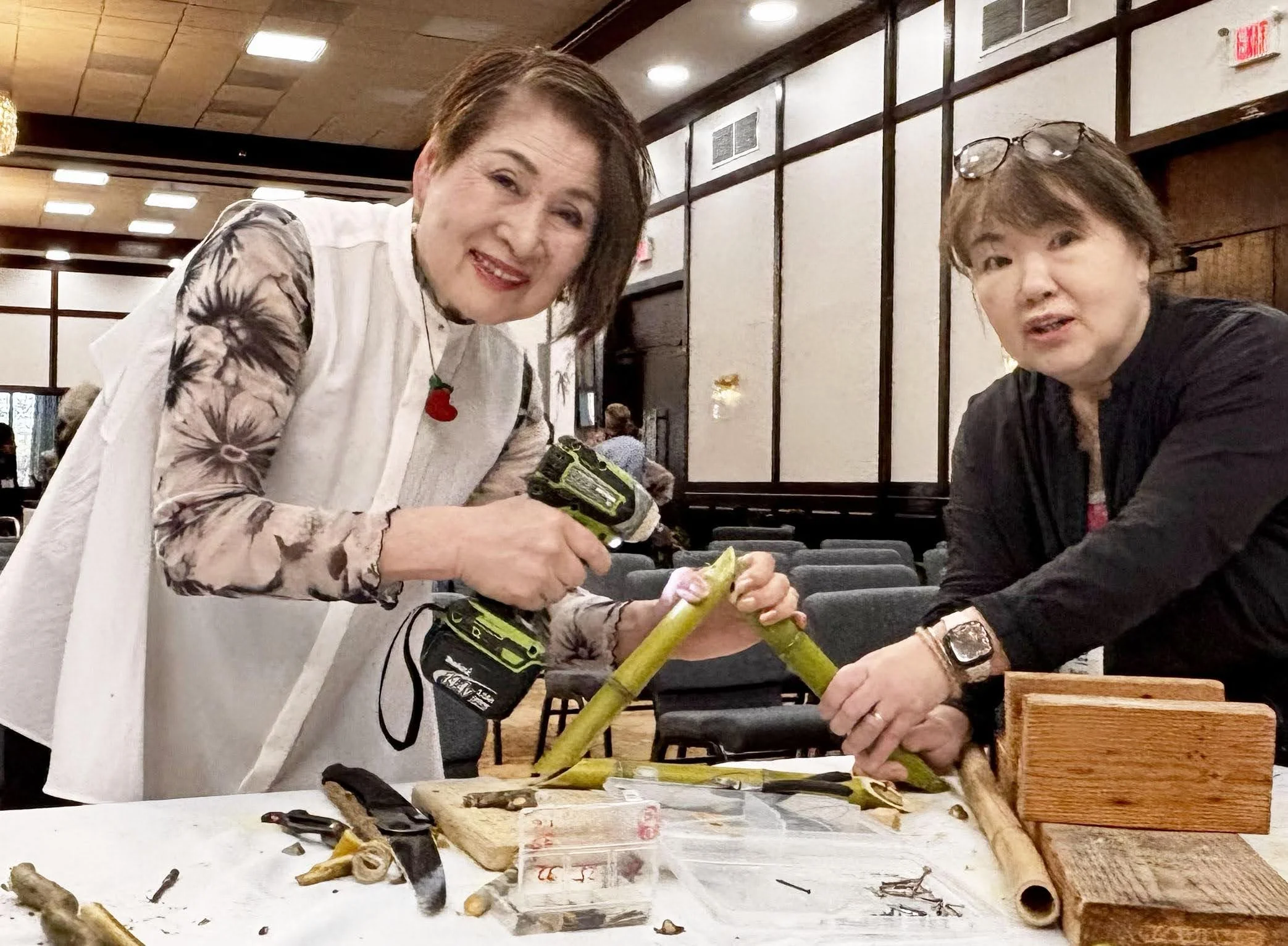 Yamaguchi and Toshiko cutting bamboo.jpg