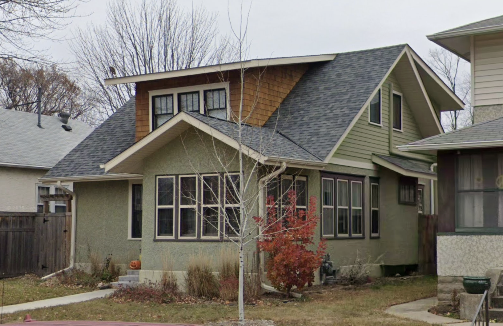  The back of this addition had full height walls across the entire space, while the front, in the interest of making it look like it was built like this originally, had a sloping roof and dormer.  