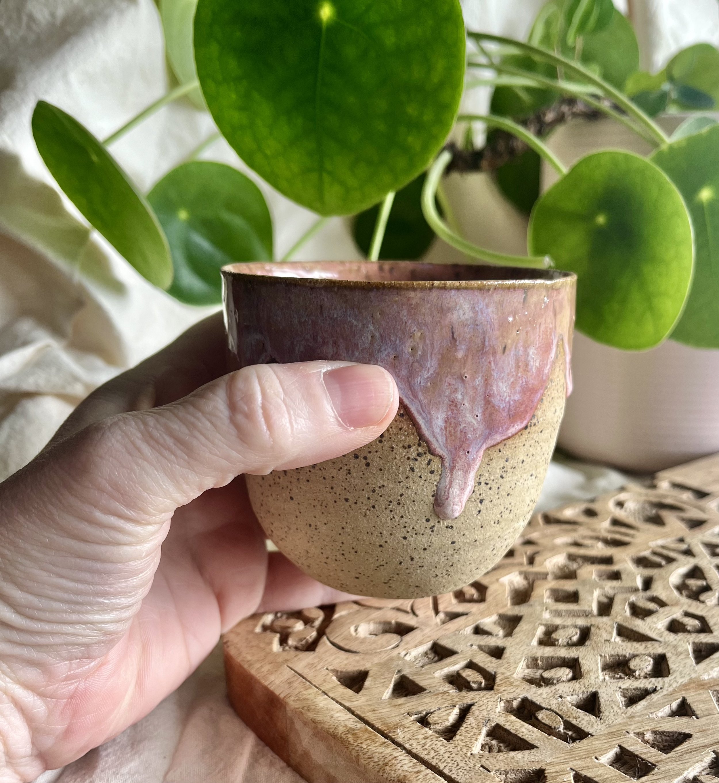 Pink scalloped cup 1 in hand view.jpeg