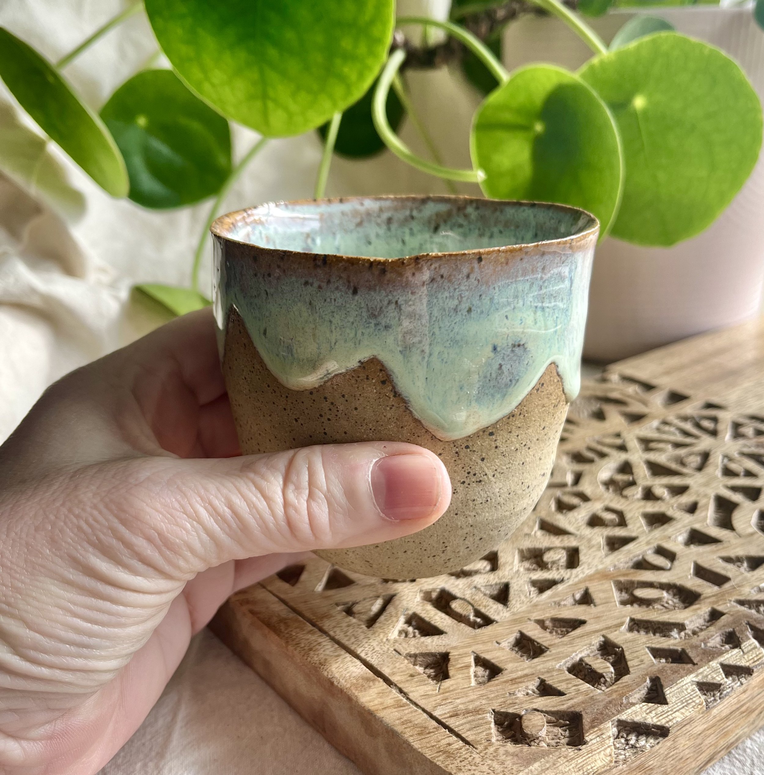 blossom green scalloped cup 2 in hand view.jpeg