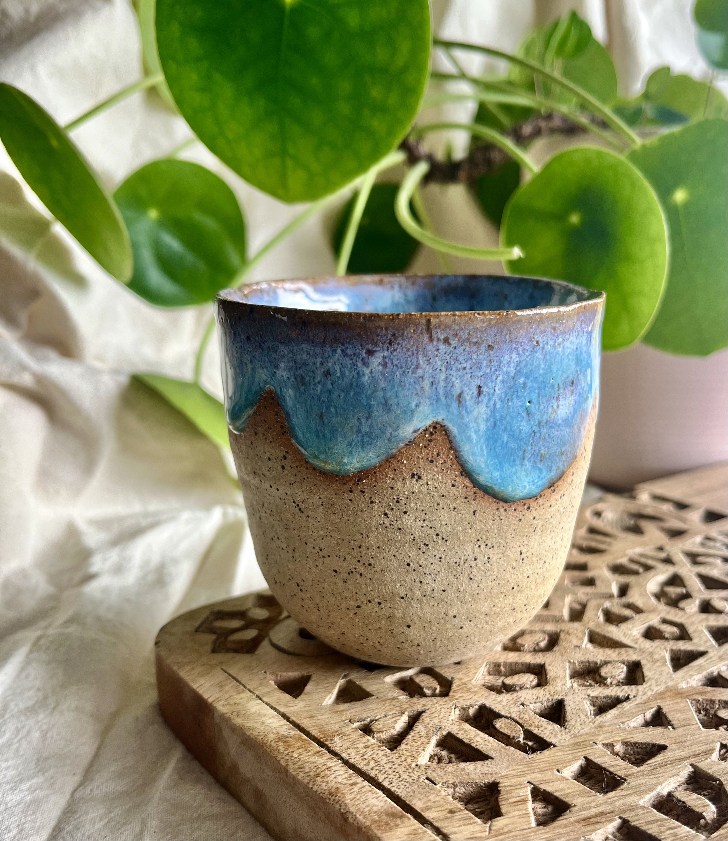 Light blue scalloped cup front view.jpeg