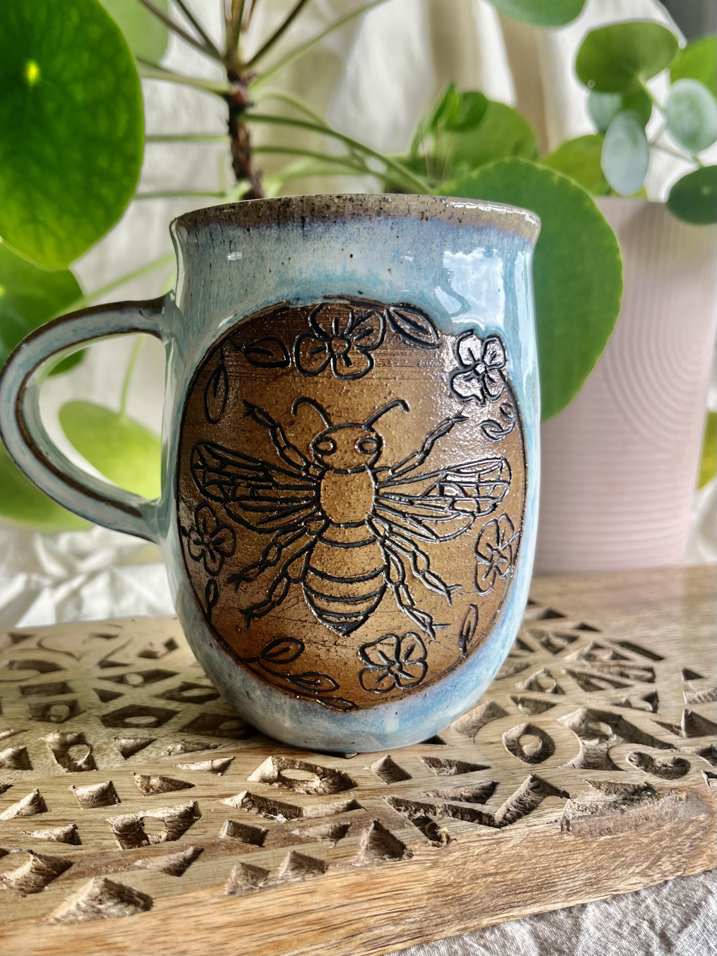 Light blue bee mug front view.jpeg