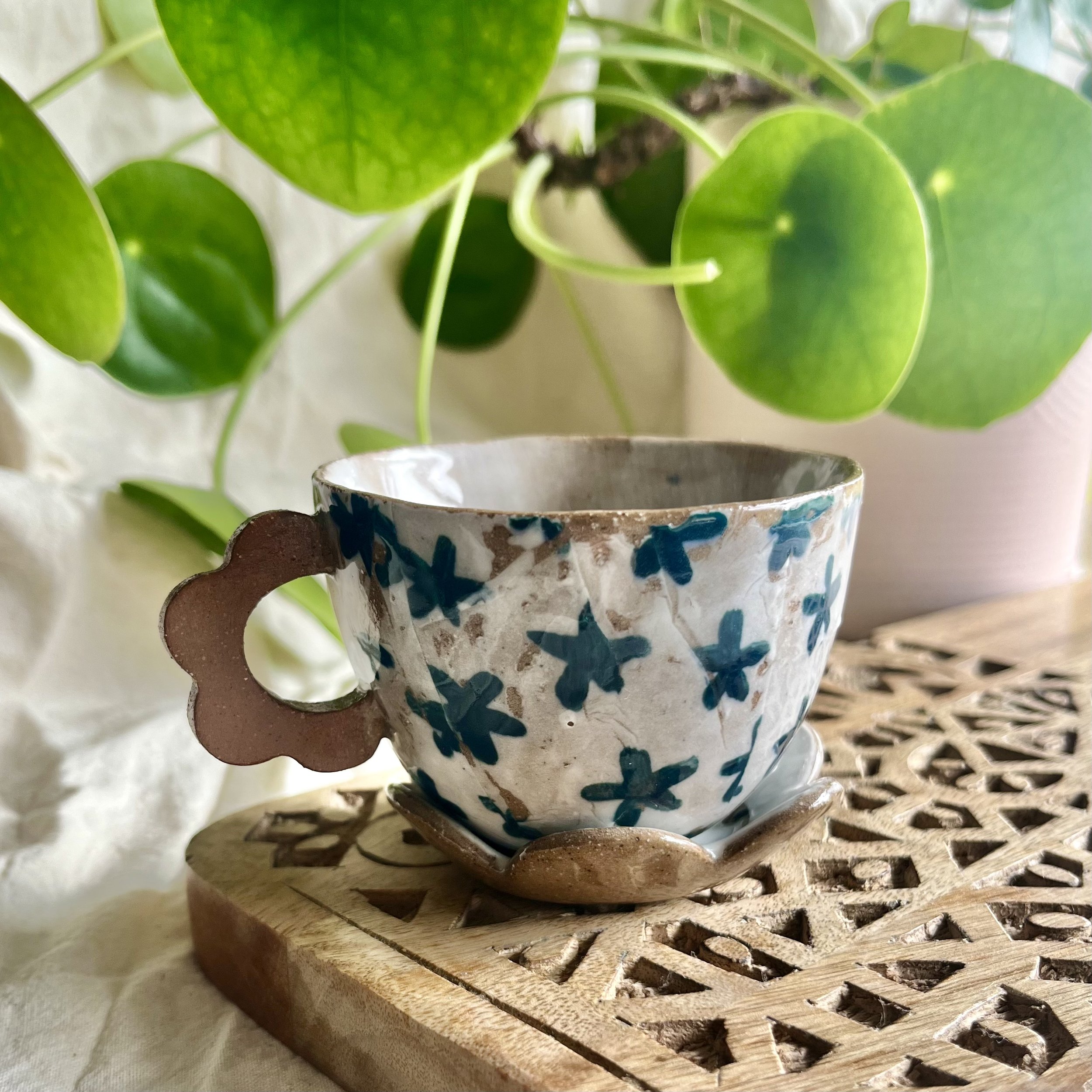 teal flower espresso cup and saucer back view.jpeg