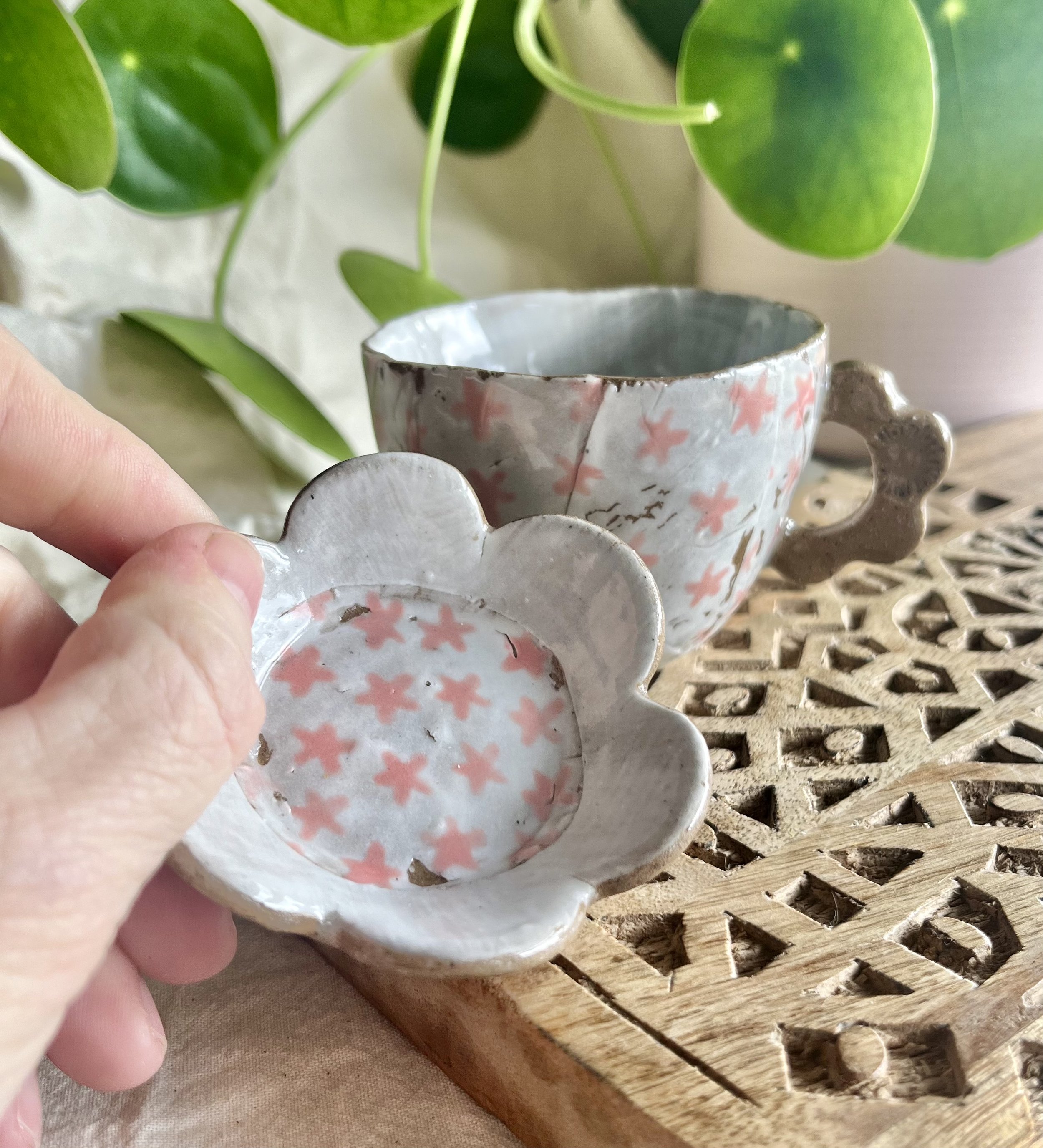 Pink flower espresso cup and saucer in hand 2.jpeg