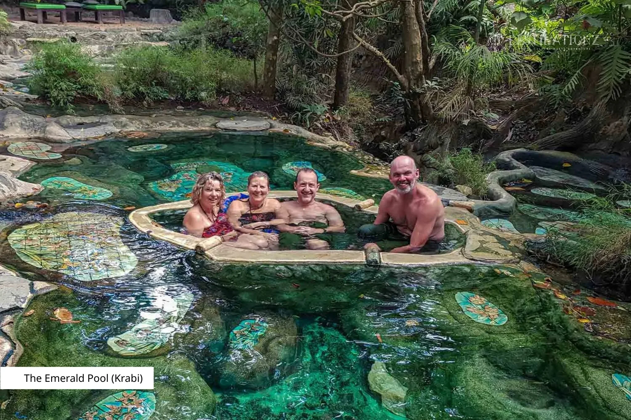 Swimming in the Emerald Pool Krabi, a family-friendly natural hot spring and top nature attraction in Thailand.