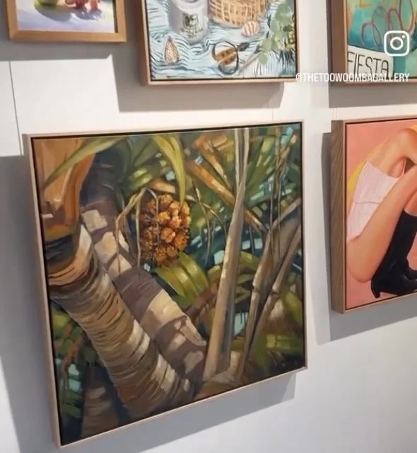 Artwork of a tropical scene with Pandanus trunks and orange fruit.