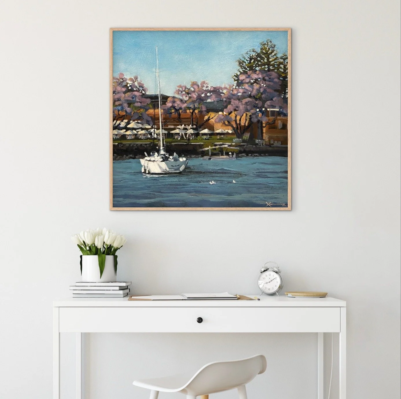 A yacht on the Brisbane River in front of Jacarandas