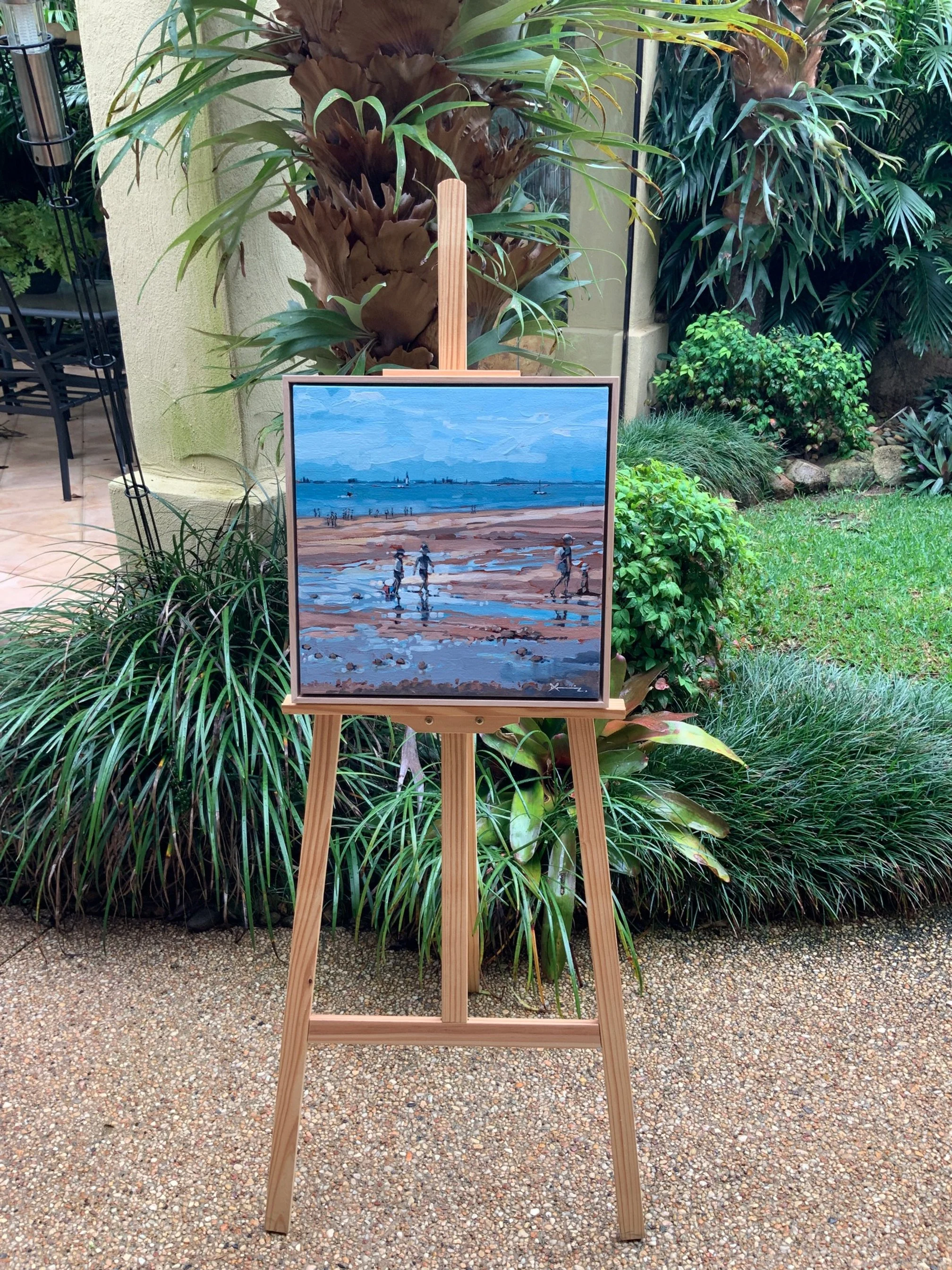 Painting of children finding shells