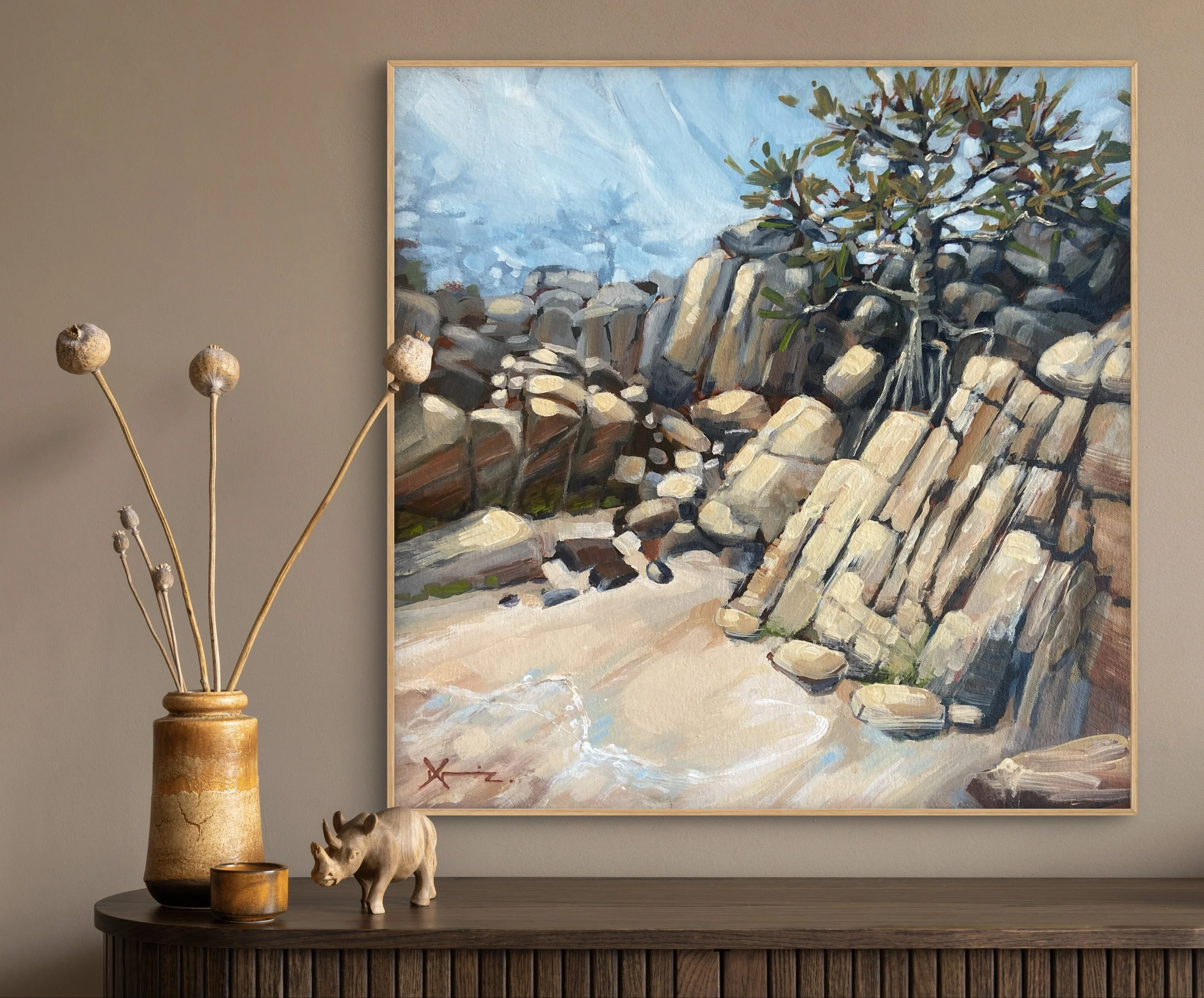 Painting of a rocky cove and pandanus