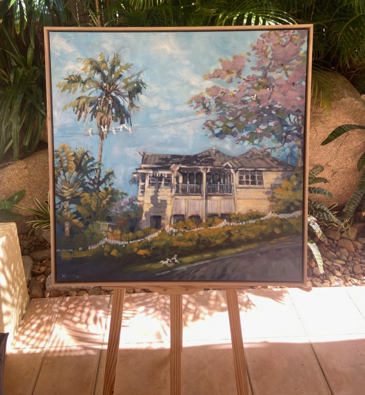Painting of a queenslander in Hawthorne on an easel.JPG