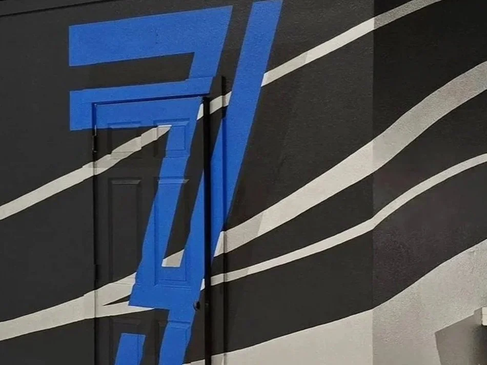 Helicopter hangar mural for Siete, Inc. - Colorado City, CO