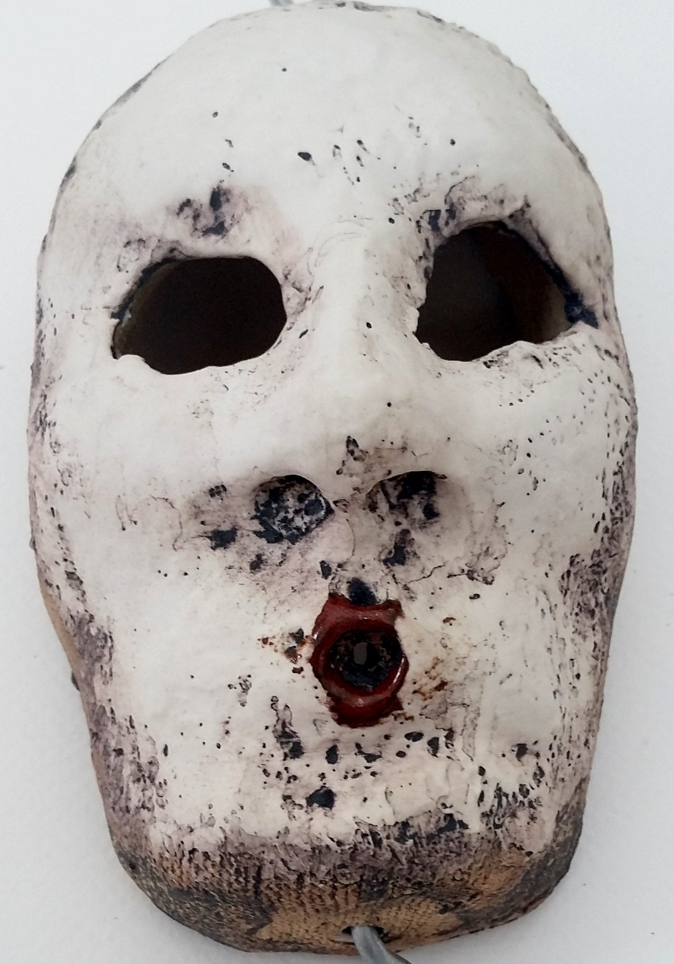 Strings Attached Installation 2017 -      
Used porcelain slip, oxide wash and some devastatingly fabulous red glaze.