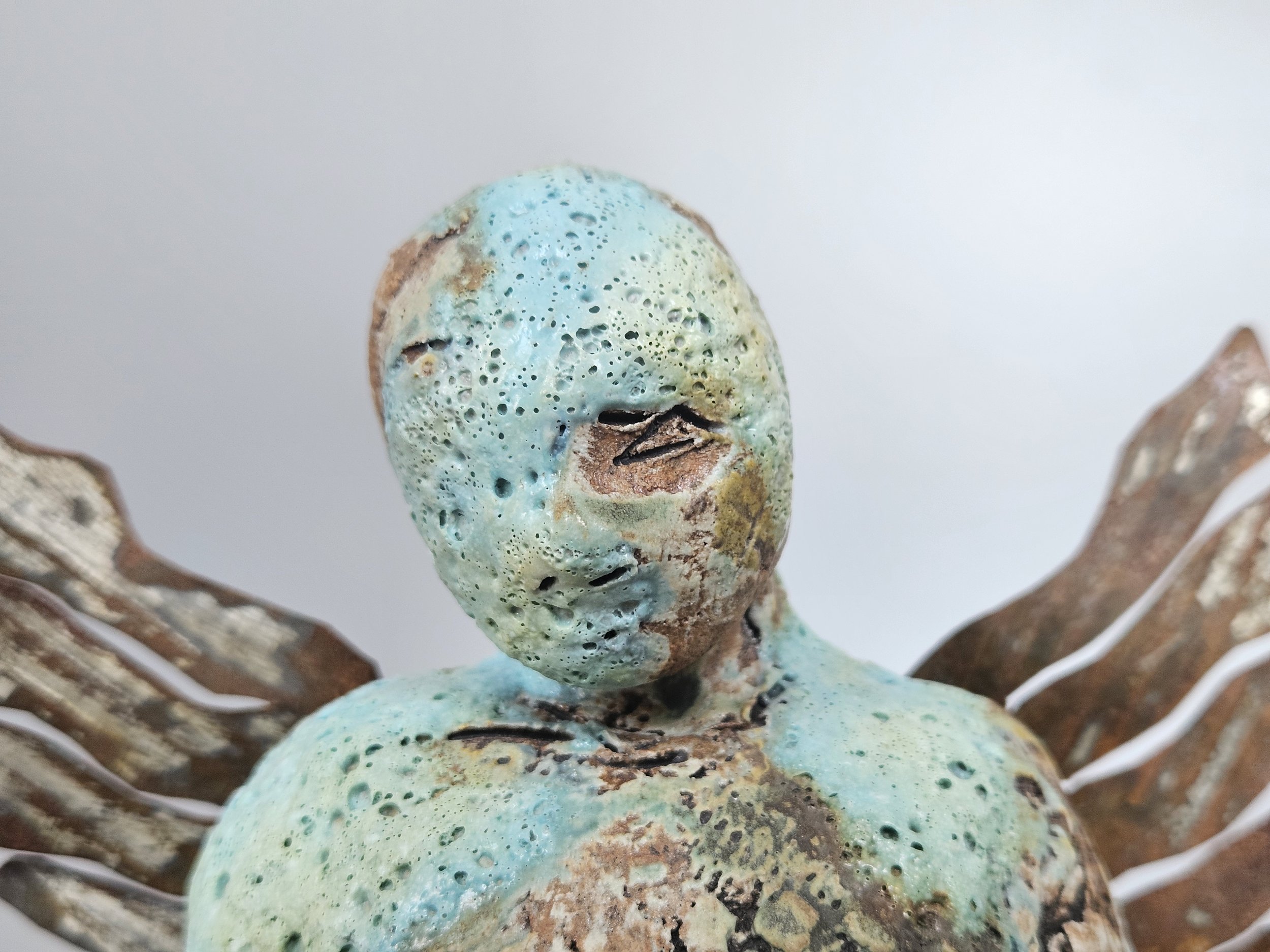 1 Winged Queue Bust Light Blue Lava