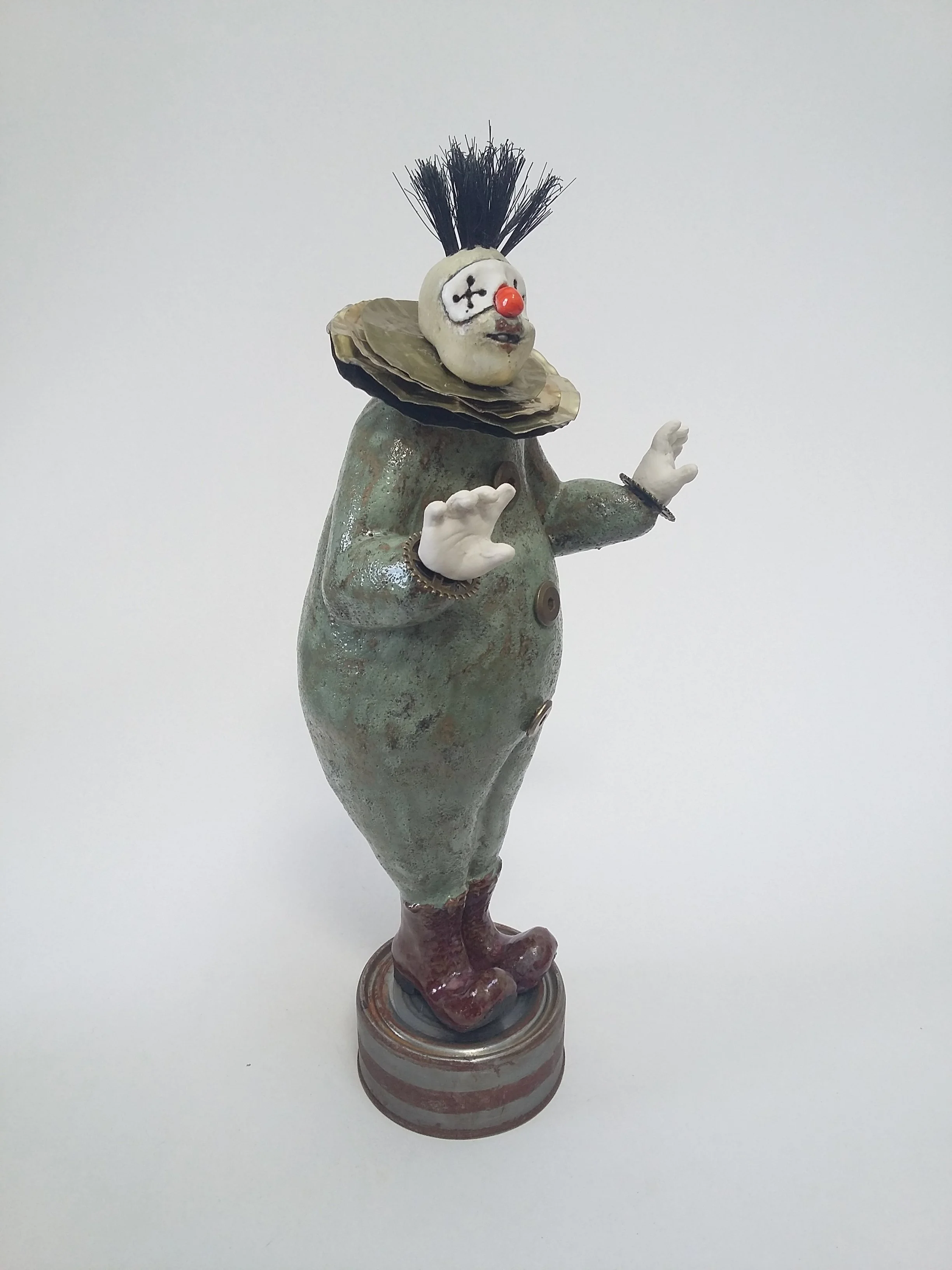 Ta Daaa - 
2018 - 
Stoneware clown figure on altered tin can, incorporating other materials
