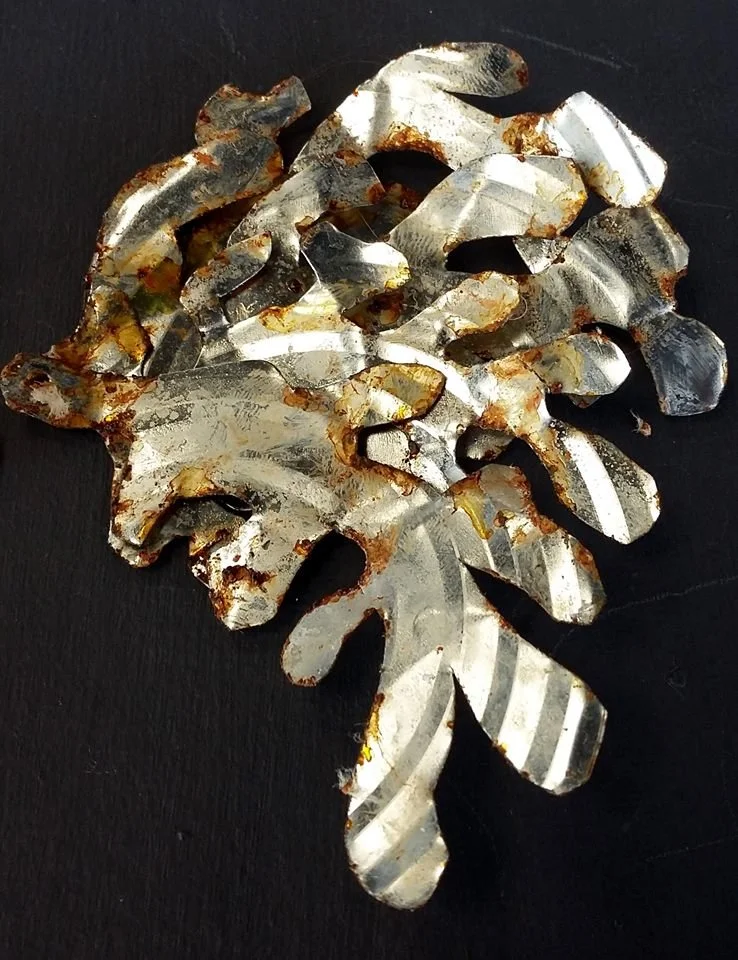 Wallflower 2017 - wings made using tin can lids