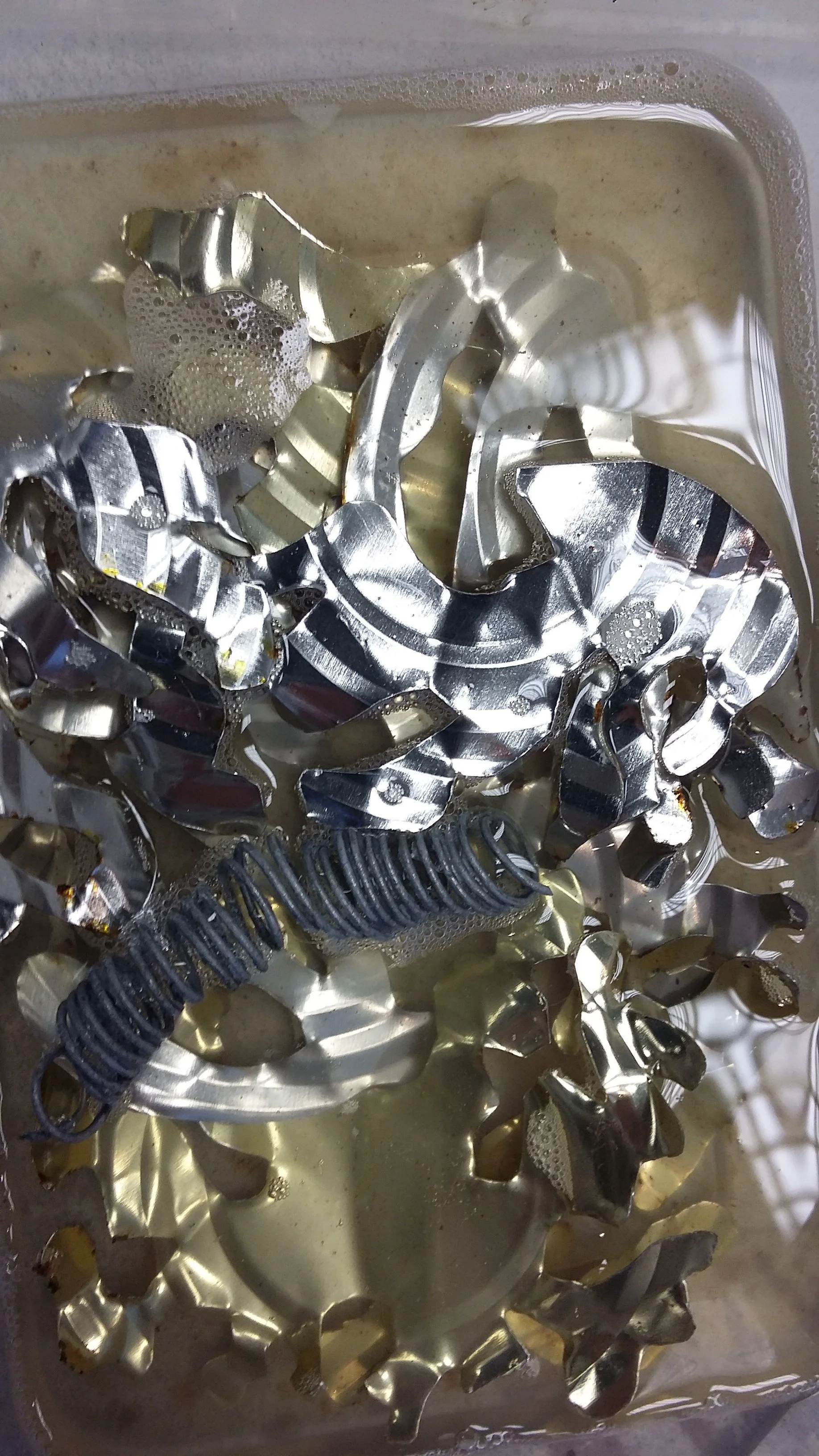 Work In Progress 2017 - lovely metal bits soaking to get the rust up.