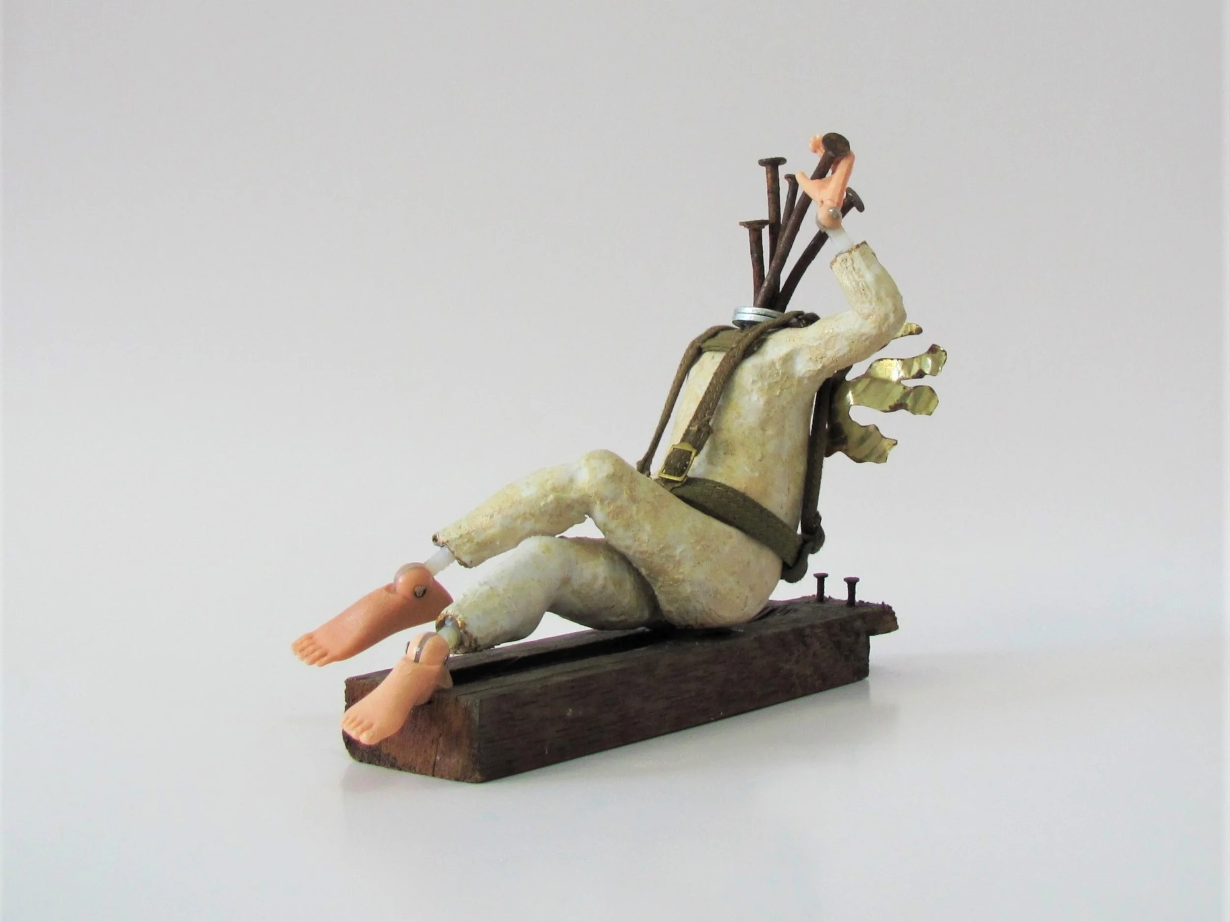 Nailed It - 
2018 - 
Stoneware figure with mixed media including Action Man feet and hands