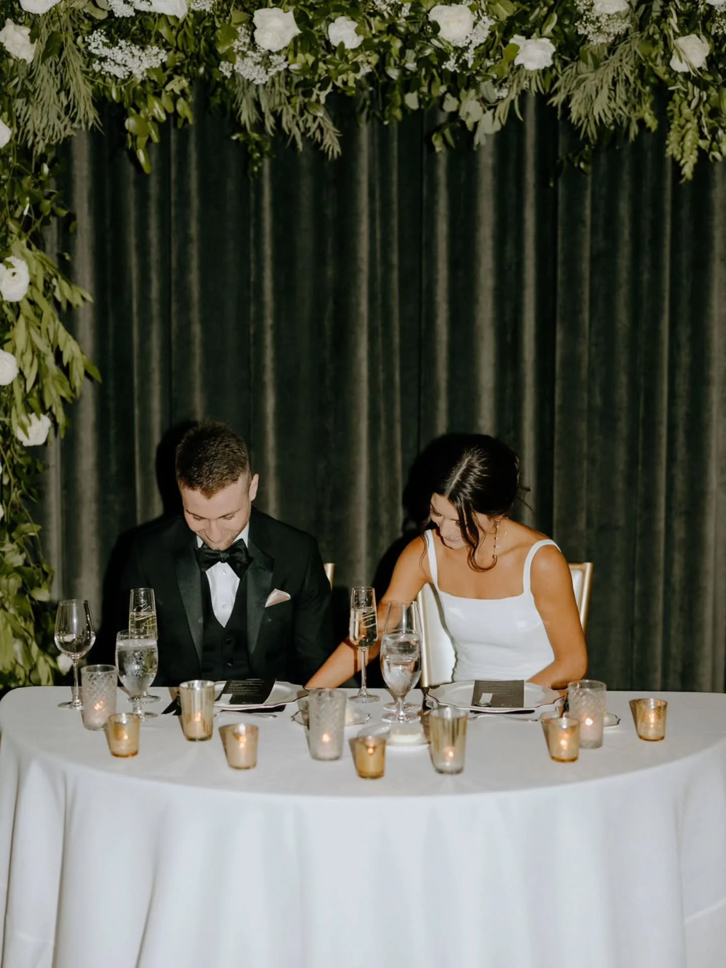 Sweetheart tables are more than just two chairs. They&rsquo;ve become a design feature. Think lush florals, custom backdrops, soft lighting...all focused on the couple. Your own personal spotlight! 

Which seating style do you love: sweetheart, head 