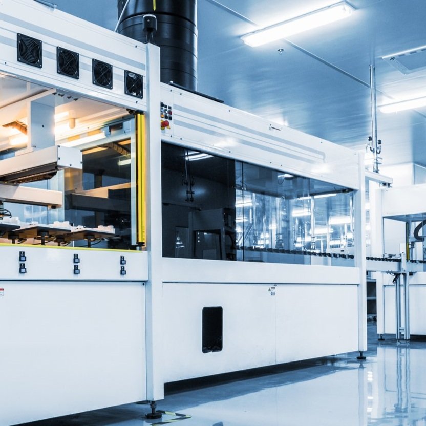 Second image of industrial warehouse with large fabrication machinery