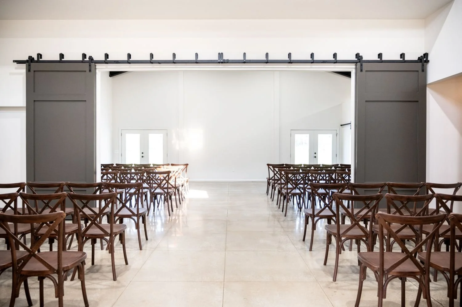 Central Alabama's Sawyers Cove Farm ceremony set up with chairs and sliding doors, a content creators dream venue
