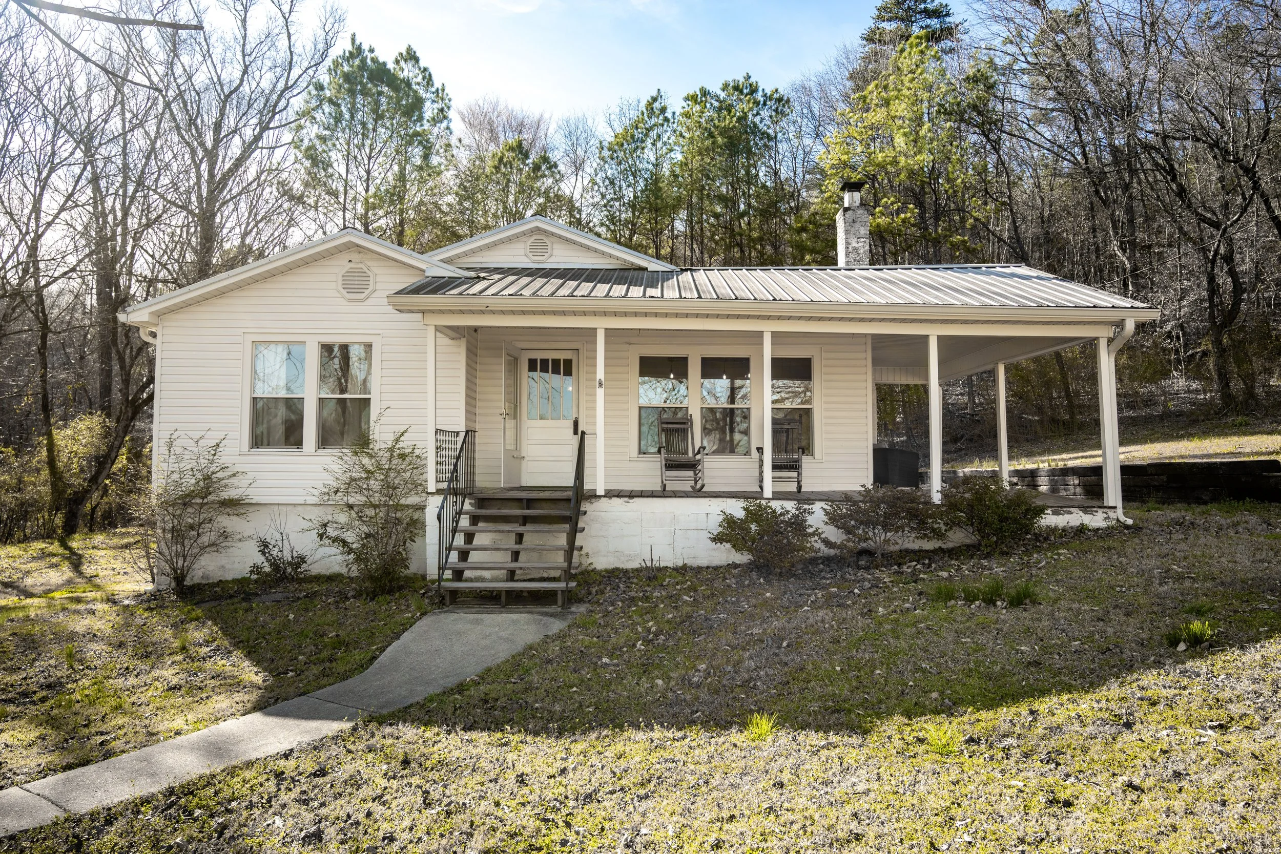 Exterior of a fully furnished 3-bedroom, 2-bath month-to-month rental home in Calera, Alabama, available for temporary housing and corporate stays.