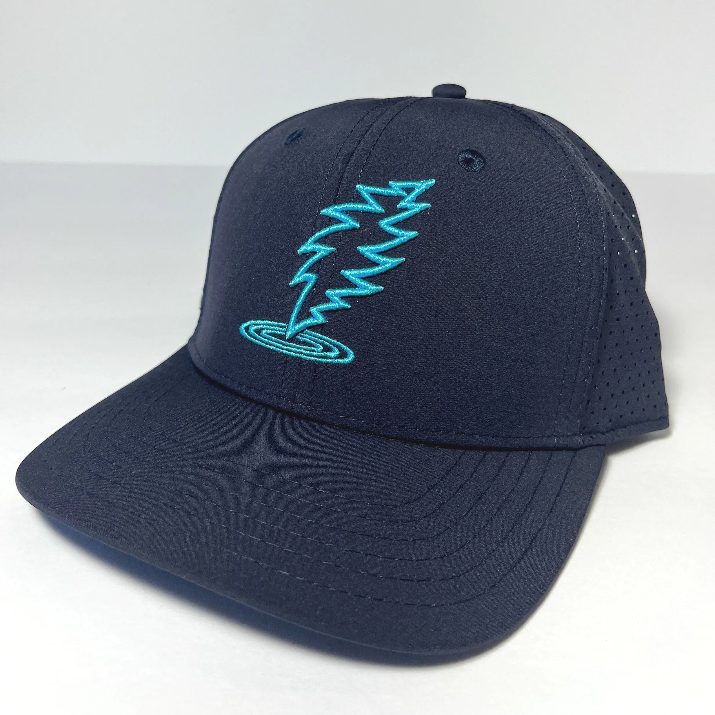Navy blue baseball cap with embroidered Aqua Dancin' bolt and Ripples design on the front.