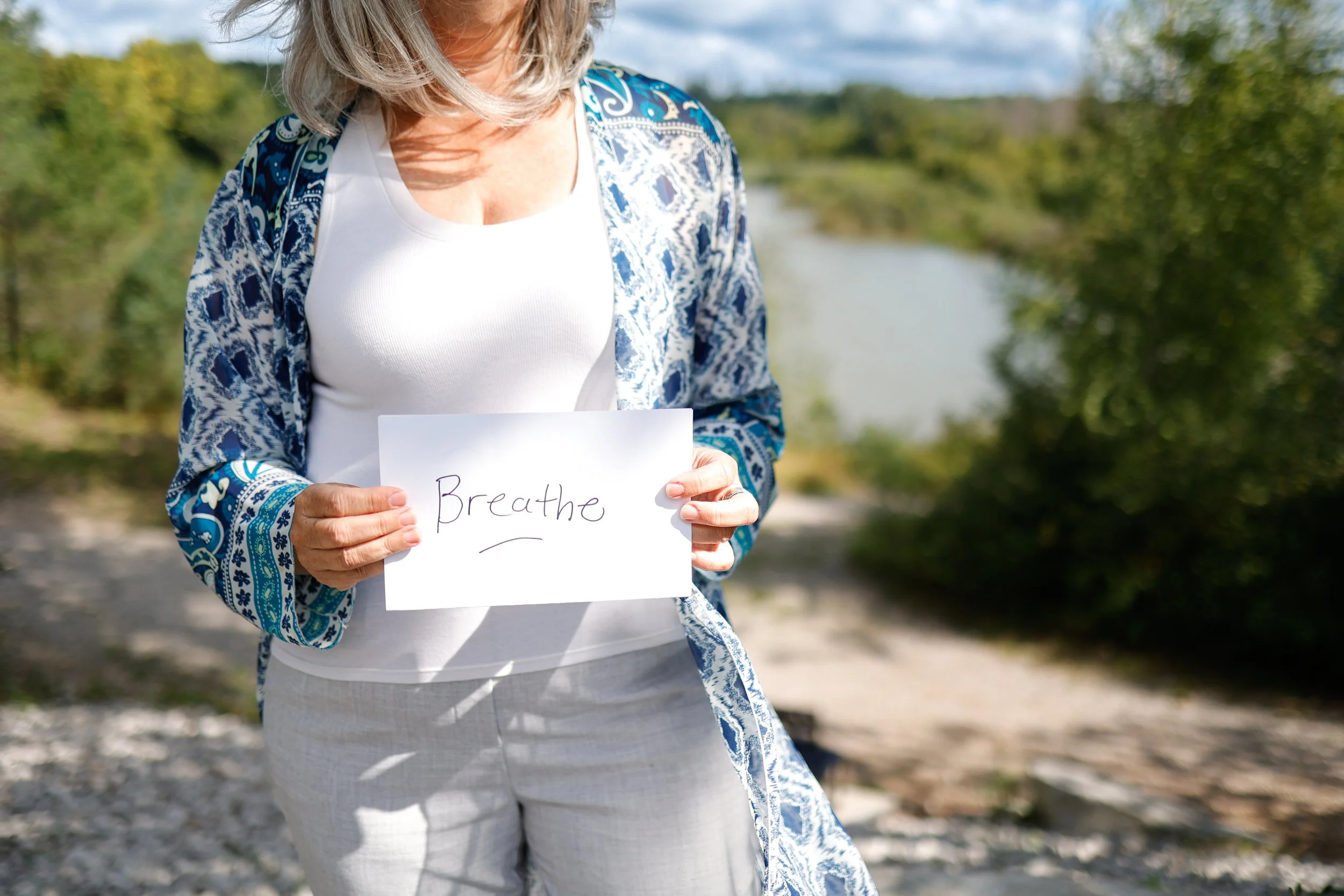 woman practicing breathwork for stress relief