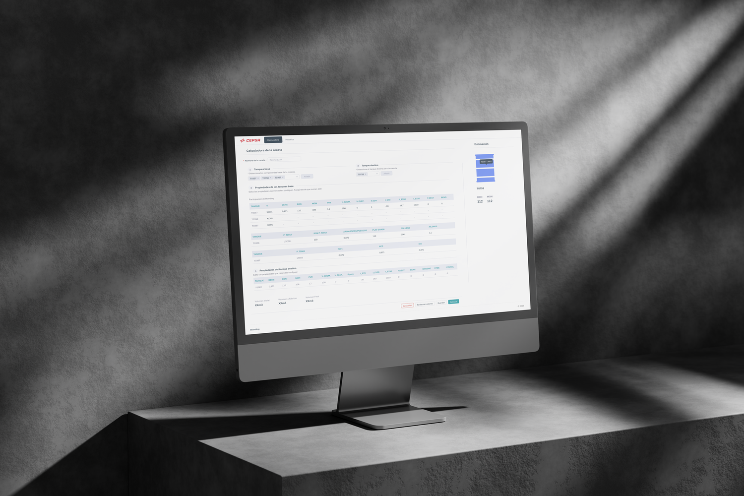A desktop computer on a grey concrete table, showing the redesigned Blending interface with a clean, functional layout.