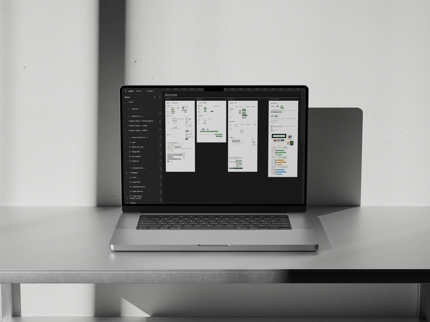 Laptop displaying the user flow of an internal Iberdrola platform, with connected steps and UI elements shown on a steel table.